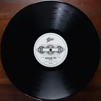 <u>PRESSING INFO</u><br><table class=inf_press><tbody><tr class=inf_info><td class=inf_title>Album:</td><td class=inf_info> Agony & Irony on US Black  </td></tr>
    <td class=inf_title>Pressing:</td><td> First Pressing /??  </td></tr>
    <td class=inf_title>Release Date:</td><td> 2008  </td></tr>
    <td class=inf_title>Album Pressed:</td><td> 2008  </td></tr>
    <td class=inf_title>Label:</td><td> Epic Records - 88697-17247-1  </td></tr>
    <td class=inf_title>Insert:</td><td> Printed Satin Inner Sleeve  </td></tr>
    <td class=inf_title>Barcode:</td><td> 8 8697-17247-1 4  </td></tr>
    <td class=inf_title>Side A Matrix:</td><td> 88697-17247-1-A ⓤ  </td></tr>
    <td class=inf_title>Side B Matrix:</td><td> 88697-17247-1-B ⓤ  </td></tr>
    <td class=inf_title>&nbsp;</td><td> <a href=https://www.discogs.com/release/1671341 target=_blank rel=noopener noreferrer>View This Release on Discogs</a>  </tr></tbody></table>
<br><u>PRICING</u><span class='less' style='padding-left: 8px; color: var(--font-colour_grey);'>(prices shown in USD)</span><br><table class='inf_press'><tbody><tr class='inf_info'>
            <td class='inf_title'>Last Sold:</td>
            <td>$130.00 (Jun 15, 2026)</td>
            </tr><tr class='inf_info'>
            <td class='inf_title'>History:</td>
            <td>
                <span class='price-low' title='Sold on Jun 6, 2024'>Low: <span class='price-value'>$60.00</span></span>
                <span class='price-separator'>|</span>
                <span class='price-avg'>Avg: <span class='price-value'>$110.57</span></span>
                <span class='price-separator'>|</span>
                <span class='price-high' title='€199.99 · Sold on May 2, 2026'>High: <span class='price-value'>$227.77</span></span>
            </td>
            </tr></tbody></table><br>    <br><br><u>TRACKLIST</u><br><table class='inf_tracks'><tbody><tr>
            <td class='inf_num'>A1</td>
            <td class='inf_trk'>Calling All Skeletons</td>
            <td class='inf_len'>3:19</td>
            <td><a href='#' class='lyric-link' data-album-code='ai' data-song-title='Calling All Skeletons'>Lyrics</a></td></tr><tr>
            <td class='inf_num'>A2</td>
            <td class='inf_trk'>Help Me</td>
            <td class='inf_len'>3:45</td>
            <td><a href='#' class='lyric-link' data-album-code='ai' data-song-title='Help Me'>Lyrics</a></td></tr><tr>
            <td class='inf_num'>A3</td>
            <td class='inf_trk'>In Vein</td>
            <td class='inf_len'>3:56</td>
            <td><a href='#' class='lyric-link' data-album-code='ai' data-song-title='In Vein'>Lyrics</a></td></tr><tr>
            <td class='inf_num'>A4</td>
            <td class='inf_trk'>Over And Out</td>
            <td class='inf_len'>3:14</td>
            <td><a href='#' class='lyric-link' data-album-code='ai' data-song-title='Over And Out'>Lyrics</a></td></tr><tr>
            <td class='inf_num'>A5</td>
            <td class='inf_trk'>I Found Away</td>
            <td class='inf_len'>4:01</td>
            <td><a href='#' class='lyric-link' data-album-code='ai' data-song-title='I Found Away'>Lyrics</a></td></tr><tr>
            <td class='inf_num'>A6</td>
            <td class='inf_trk'>Do You Wanna Know?</td>
            <td class='inf_len'>3:36</td>
            <td><a href='#' class='lyric-link' data-album-code='ai' data-song-title='Do You Wanna Know?'>Lyrics</a></td></tr><tr>
            <td class='inf_num'>B1</td>
            <td class='inf_trk'>Live Young, Die Fast</td>
            <td class='inf_len'>4:14</td>
            <td><a href='#' class='lyric-link' data-album-code='ai' data-song-title='Live Young, Die Fast'>Lyrics</a></td></tr><tr>
            <td class='inf_num'>B2</td>
            <td class='inf_trk'>Love Love, Kiss Kiss</td>
            <td class='inf_len'>3:25</td>
            <td><a href='#' class='lyric-link' data-album-code='ai' data-song-title='Love Love, Kiss Kiss'>Lyrics</a></td></tr><tr>
            <td class='inf_num'>B3</td>
            <td class='inf_trk'>Lost And Rendered</td>
            <td class='inf_len'>3:23</td>
            <td><a href='#' class='lyric-link' data-album-code='ai' data-song-title='Lost And Rendered'>Lyrics</a></td></tr><tr>
            <td class='inf_num'>B4</td>
            <td class='inf_trk'>Ruin It</td>
            <td class='inf_len'>3:36</td>
            <td><a href='#' class='lyric-link' data-album-code='ai' data-song-title='Ruin It'>Lyrics</a></td></tr><tr>
            <td class='inf_num'>B5</td>
            <td class='inf_trk'>Into The Night</td>
            <td class='inf_len'>3:23</td>
            <td><a href='#' class='lyric-link' data-album-code='ai' data-song-title='Into The Night'>Lyrics</a></td></tr></tbody></table><br><br>
    <u>NOTES</u><br> Both 'w's in the runouts are circled. Single LP, gatefold sleeve. Printed inner sleeve. Came with a download card for a digital copy of the album.
 - B
