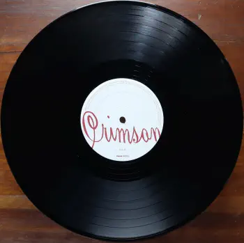 <u>PRESSING INFO</u><br><table class=inf_press><tbody><tr class=inf_info><td class=inf_title>Album:</td><td class=inf_info> Crimson on 180g Black (Vagrant 20th Anniversary)  </td></tr>
    <td class=inf_title>Pressing:</td><td> Third Pressing /??  </td></tr>
    <td class=inf_title>Release Date:</td><td> Feb. 8th 2017  </td></tr>
    <td class=inf_title>Album Pressed:</td><td> 2017  </td></tr>
    <td class=inf_title>Label:</td><td> Vagrant Records/BMG VR4404  </td></tr>
    <td class=inf_title>Insert:</td><td> Double Sided Glossy  </td></tr>
    <td class=inf_title>Barcode:</td><td> 4 050538-230123  </td></tr>
    <td class=inf_title>Side A Matrix:</td><td> ALKALINE TRIO-CRIMSON SP VR 4404 A plush v  </td></tr>
    <td class=inf_title>Side B Matrix:</td><td> THE ALKALINE TRIO-CRIMSON VR 4404 B plush v  </td></tr>
    <td class=inf_title>&nbsp;</td><td> <a href=https://www.discogs.com/release/9726458 target=_blank rel=noopener noreferrer>View This Release on Discogs</a>  </tr></tbody></table>
<br><u>PRICING</u><span class='less' style='padding-left: 8px; color: var(--font-colour_grey);'>(prices shown in USD)</span><br><table class='inf_press'><tbody><tr class='inf_info'>
            <td class='inf_title'>Last Sold:</td>
            <td>$79.99 (Feb 1, 2026)</td>
            </tr><tr class='inf_info'>
            <td class='inf_title'>History:</td>
            <td>
                <span class='price-low' title='Sold on Jan 21, 2024'>Low: <span class='price-value'>$22.00</span></span>
                <span class='price-separator'>|</span>
                <span class='price-avg'>Avg: <span class='price-value'>$95.93</span></span>
                <span class='price-separator'>|</span>
                <span class='price-high' title='Sold on Aug 26, 2020'>High: <span class='price-value'>$190.00</span></span>
            </td>
            </tr></tbody></table><br>    <br><br><u>TRACKLIST</u><br><table class='inf_tracks'><tbody><tr>
            <td class='inf_num'>A1</td>
            <td class='inf_trk'>Time To Waste</td>
            <td class='inf_len'>4:11</td>
            <td><a href='#' class='lyric-link' data-album-code='crimson' data-song-title='Time To Waste'>Lyrics</a></td></tr><tr>
            <td class='inf_num'>A2</td>
            <td class='inf_trk'>The Poison</td>
            <td class='inf_len'>2:04</td>
            <td><a href='#' class='lyric-link' data-album-code='crimson' data-song-title='The Poison'>Lyrics</a></td></tr><tr>
            <td class='inf_num'>A3</td>
            <td class='inf_trk'>Burn</td>
            <td class='inf_len'>4:05</td>
            <td><a href='#' class='lyric-link' data-album-code='crimson' data-song-title='Burn'>Lyrics</a></td></tr><tr>
            <td class='inf_num'>A4</td>
            <td class='inf_trk'>Mercy Me</td>
            <td class='inf_len'>2:49</td>
            <td><a href='#' class='lyric-link' data-album-code='crimson' data-song-title='Mercy Me'>Lyrics</a></td></tr><tr>
            <td class='inf_num'>A5</td>
            <td class='inf_trk'>Dethbed</td>
            <td class='inf_len'>3:03</td>
            <td><a href='#' class='lyric-link' data-album-code='crimson' data-song-title='Dethbed'>Lyrics</a></td></tr><tr>
            <td class='inf_num'>A6</td>
            <td class='inf_trk'>Settle For Satin</td>
            <td class='inf_len'>3:49</td>
            <td><a href='#' class='lyric-link' data-album-code='crimson' data-song-title='Settle For Satin'>Lyrics</a></td></tr><tr>
            <td class='inf_num'>A7</td>
            <td class='inf_trk'>Sadie</td>
            <td class='inf_len'>4:39</td>
            <td><a href='#' class='lyric-link' data-album-code='crimson' data-song-title='Sadie'>Lyrics</a></td></tr><tr>
            <td class='inf_num'>B1</td>
            <td class='inf_trk'>Fall Victim</td>
            <td class='inf_len'>3:18</td>
            <td><a href='#' class='lyric-link' data-album-code='crimson' data-song-title='Fall Victim'>Lyrics</a></td></tr><tr>
            <td class='inf_num'>B2</td>
            <td class='inf_trk'>I Was A Prayer</td>
            <td class='inf_len'>2:36</td>
            <td><a href='#' class='lyric-link' data-album-code='crimson' data-song-title='I Was A Prayer'>Lyrics</a></td></tr><tr>
            <td class='inf_num'>B3</td>
            <td class='inf_trk'>Prevent This Tragedy</td>
            <td class='inf_len'>3:06</td>
            <td><a href='#' class='lyric-link' data-album-code='crimson' data-song-title='Prevent This Tragedy'>Lyrics</a></td></tr><tr>
            <td class='inf_num'>B4</td>
            <td class='inf_trk'>Back To Hell</td>
            <td class='inf_len'>2:54</td>
            <td><a href='#' class='lyric-link' data-album-code='crimson' data-song-title='Back To Hell'>Lyrics</a></td></tr><tr>
            <td class='inf_num'>B5</td>
            <td class='inf_trk'>Your Neck</td>
            <td class='inf_len'>3:15</td>
            <td><a href='#' class='lyric-link' data-album-code='crimson' data-song-title='Your Neck'>Lyrics</a></td></tr><tr>
            <td class='inf_num'>B6</td>
            <td class='inf_trk'>Smoke</td>
            <td class='inf_len'>2:59</td>
            <td><a href='#' class='lyric-link' data-album-code='crimson' data-song-title='Smoke'>Lyrics</a></td></tr></tbody></table><br><br>
    <u>NOTES</u><br> Released as part of the Vagrant 20th Anniversary series alongside Good Mourning and From Here to Infirmary.
 - B