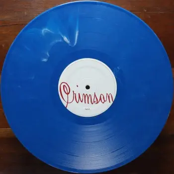<u>PRESSING INFO</u><br><table class=inf_press><tbody><tr class=inf_info><td class=inf_title>Album:</td><td class=inf_info> Crimson on Solid Blue | Clear Blue (2x Blue Variant)  </td></tr>
    <td class=inf_title>Pressing:</td><td> Second Pressing /300+  </td></tr>
    <td class=inf_title>Release Date:</td><td> Dec. 15th 2009  </td></tr>
    <td class=inf_title>Album Pressed:</td><td> 2009  </td></tr>
    <td class=inf_title>Label:</td><td> Vagrant Records/Cobraside CSDLP1127  </td></tr>
    <td class=inf_title>Insert:</td><td> Double Sided Glossy  </td></tr>
    <td class=inf_title>Barcode:</td><td> 8 29707-95271 5  </td></tr>
    <td class=inf_title>Side A Matrix:</td><td> CSDLP-1127-A  </td></tr>
    <td class=inf_title>Side B Matrix:</td><td> CSDLP-1127-B  </td></tr>
    <td class=inf_title>Side C Matrix:</td><td> CSDLP-1127-C  </td></tr>
    <td class=inf_title>Side D Matrix:</td><td> CSDLP-1127-D  </td></tr>
    <td class=inf_title>&nbsp;</td><td> <a href=https://www.discogs.com/release/4257198 target=_blank rel=noopener noreferrer>View This Release on Discogs</a>  </tr></tbody></table>
<br><u>PRICING</u><span class='less' style='padding-left: 8px; color: var(--font-colour_grey);'>(prices shown in USD)</span><br><table class='inf_press'><tbody><tr class='inf_info'>
            <td class='inf_title'>Last Sold:</td>
            <td>$99.99 (Jul 19, 2025)</td>
            </tr><tr class='inf_info'>
            <td class='inf_title'>History:</td>
            <td>
                <span class='price-low' title='Sold on Feb 28, 2019'>Low: <span class='price-value'>$40.00</span></span>
                <span class='price-separator'>|</span>
                <span class='price-avg'>Avg: <span class='price-value'>$88.16</span></span>
                <span class='price-separator'>|</span>
                <span class='price-high' title='Sold on Nov 26, 2022'>High: <span class='price-value'>$125.00</span></span>
            </td>
            </tr></tbody></table><br>    <br><br><u>TRACKLIST</u><br><table class='inf_tracks'><tbody><tr>
            <td class='inf_num'>A1</td>
            <td class='inf_trk'>Time To Waste</td>
            <td class='inf_len'>4:11</td>
            <td><a href='#' class='lyric-link' data-album-code='crimson' data-song-title='Time To Waste'>Lyrics</a></td></tr><tr>
            <td class='inf_num'>A2</td>
            <td class='inf_trk'>The Poison</td>
            <td class='inf_len'>2:04</td>
            <td><a href='#' class='lyric-link' data-album-code='crimson' data-song-title='The Poison'>Lyrics</a></td></tr><tr>
            <td class='inf_num'>A3</td>
            <td class='inf_trk'>Burn</td>
            <td class='inf_len'>4:05</td>
            <td><a href='#' class='lyric-link' data-album-code='crimson' data-song-title='Burn'>Lyrics</a></td></tr><tr>
            <td class='inf_num'>B1</td>
            <td class='inf_trk'>Mercy Me</td>
            <td class='inf_len'>2:49</td>
            <td><a href='#' class='lyric-link' data-album-code='crimson' data-song-title='Mercy Me'>Lyrics</a></td></tr><tr>
            <td class='inf_num'>B2</td>
            <td class='inf_trk'>Dethbed</td>
            <td class='inf_len'>3:03</td>
            <td><a href='#' class='lyric-link' data-album-code='crimson' data-song-title='Dethbed'>Lyrics</a></td></tr><tr>
            <td class='inf_num'>B3</td>
            <td class='inf_trk'>Settle For Satin</td>
            <td class='inf_len'>3:49</td>
            <td><a href='#' class='lyric-link' data-album-code='crimson' data-song-title='Settle For Satin'>Lyrics</a></td></tr><tr>
            <td class='inf_num'>C1</td>
            <td class='inf_trk'>Sadie</td>
            <td class='inf_len'>4:39</td>
            <td><a href='#' class='lyric-link' data-album-code='crimson' data-song-title='Sadie'>Lyrics</a></td></tr><tr>
            <td class='inf_num'>C2</td>
            <td class='inf_trk'>Fall Victim</td>
            <td class='inf_len'>3:18</td>
            <td><a href='#' class='lyric-link' data-album-code='crimson' data-song-title='Fall Victim'>Lyrics</a></td></tr><tr>
            <td class='inf_num'>C3</td>
            <td class='inf_trk'>I Was A Prayer</td>
            <td class='inf_len'>2:36</td>
            <td><a href='#' class='lyric-link' data-album-code='crimson' data-song-title='I Was A Prayer'>Lyrics</a></td></tr><tr>
            <td class='inf_num'>D1</td>
            <td class='inf_trk'>Prevent This Tragedy</td>
            <td class='inf_len'>3:06</td>
            <td><a href='#' class='lyric-link' data-album-code='crimson' data-song-title='Prevent This Tragedy'>Lyrics</a></td></tr><tr>
            <td class='inf_num'>D2</td>
            <td class='inf_trk'>Back To Hell</td>
            <td class='inf_len'>2:54</td>
            <td><a href='#' class='lyric-link' data-album-code='crimson' data-song-title='Back To Hell'>Lyrics</a></td></tr><tr>
            <td class='inf_num'>D3</td>
            <td class='inf_trk'>Your Neck</td>
            <td class='inf_len'>3:15</td>
            <td><a href='#' class='lyric-link' data-album-code='crimson' data-song-title='Your Neck'>Lyrics</a></td></tr><tr>
            <td class='inf_num'>D4</td>
            <td class='inf_trk'>Smoke</td>
            <td class='inf_len'>2:59</td>
            <td><a href='#' class='lyric-link' data-album-code='crimson' data-song-title='Smoke'>Lyrics</a></td></tr></tbody></table><br><br>
    <u>NOTES</u><br> This variant is part of the 300+ blue, however the A/B vinyl is solid blue instead of transparent. Not many copies were pressed with this solid A/B vinyl, so having one is quite rare. Matte NON gatefold sleeve. White A/B labels, Red C/D labels. Crimson's 2nd press was /1000 copies, divided into 7 different colour variants.
 - B