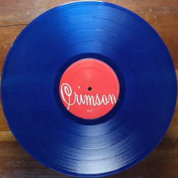<u>PRESSING INFO</u><br><table class=inf_press><tbody><tr class=inf_info><td class=inf_title>Album:</td><td class=inf_info> Crimson on Solid Blue | Clear Blue (2x Blue Variant)  </td></tr>
    <td class=inf_title>Pressing:</td><td> Second Pressing /300+  </td></tr>
    <td class=inf_title>Release Date:</td><td> Dec. 15th 2009  </td></tr>
    <td class=inf_title>Album Pressed:</td><td> 2009  </td></tr>
    <td class=inf_title>Label:</td><td> Vagrant Records/Cobraside CSDLP1127  </td></tr>
    <td class=inf_title>Insert:</td><td> Double Sided Glossy  </td></tr>
    <td class=inf_title>Barcode:</td><td> 8 29707-95271 5  </td></tr>
    <td class=inf_title>Side A Matrix:</td><td> CSDLP-1127-A  </td></tr>
    <td class=inf_title>Side B Matrix:</td><td> CSDLP-1127-B  </td></tr>
    <td class=inf_title>Side C Matrix:</td><td> CSDLP-1127-C  </td></tr>
    <td class=inf_title>Side D Matrix:</td><td> CSDLP-1127-D  </td></tr>
    <td class=inf_title>&nbsp;</td><td> <a href=https://www.discogs.com/release/4257198 target=_blank rel=noopener noreferrer>View This Release on Discogs</a>  </tr></tbody></table>
<br><u>PRICING</u><span class='less' style='padding-left: 8px; color: var(--font-colour_grey);'>(prices shown in USD)</span><br><table class='inf_press'><tbody><tr class='inf_info'>
            <td class='inf_title'>Last Sold:</td>
            <td>$99.99 (Jul 19, 2025)</td>
            </tr><tr class='inf_info'>
            <td class='inf_title'>History:</td>
            <td>
                <span class='price-low' title='Sold on Feb 28, 2019'>Low: <span class='price-value'>$40.00</span></span>
                <span class='price-separator'>|</span>
                <span class='price-avg'>Avg: <span class='price-value'>$88.16</span></span>
                <span class='price-separator'>|</span>
                <span class='price-high' title='Sold on Nov 26, 2022'>High: <span class='price-value'>$125.00</span></span>
            </td>
            </tr></tbody></table><br>    <br><br><u>TRACKLIST</u><br><table class='inf_tracks'><tbody><tr>
            <td class='inf_num'>A1</td>
            <td class='inf_trk'>Time To Waste</td>
            <td class='inf_len'>4:11</td>
            <td><a href='#' class='lyric-link' data-album-code='crimson' data-song-title='Time To Waste'>Lyrics</a></td></tr><tr>
            <td class='inf_num'>A2</td>
            <td class='inf_trk'>The Poison</td>
            <td class='inf_len'>2:04</td>
            <td><a href='#' class='lyric-link' data-album-code='crimson' data-song-title='The Poison'>Lyrics</a></td></tr><tr>
            <td class='inf_num'>A3</td>
            <td class='inf_trk'>Burn</td>
            <td class='inf_len'>4:05</td>
            <td><a href='#' class='lyric-link' data-album-code='crimson' data-song-title='Burn'>Lyrics</a></td></tr><tr>
            <td class='inf_num'>B1</td>
            <td class='inf_trk'>Mercy Me</td>
            <td class='inf_len'>2:49</td>
            <td><a href='#' class='lyric-link' data-album-code='crimson' data-song-title='Mercy Me'>Lyrics</a></td></tr><tr>
            <td class='inf_num'>B2</td>
            <td class='inf_trk'>Dethbed</td>
            <td class='inf_len'>3:03</td>
            <td><a href='#' class='lyric-link' data-album-code='crimson' data-song-title='Dethbed'>Lyrics</a></td></tr><tr>
            <td class='inf_num'>B3</td>
            <td class='inf_trk'>Settle For Satin</td>
            <td class='inf_len'>3:49</td>
            <td><a href='#' class='lyric-link' data-album-code='crimson' data-song-title='Settle For Satin'>Lyrics</a></td></tr><tr>
            <td class='inf_num'>C1</td>
            <td class='inf_trk'>Sadie</td>
            <td class='inf_len'>4:39</td>
            <td><a href='#' class='lyric-link' data-album-code='crimson' data-song-title='Sadie'>Lyrics</a></td></tr><tr>
            <td class='inf_num'>C2</td>
            <td class='inf_trk'>Fall Victim</td>
            <td class='inf_len'>3:18</td>
            <td><a href='#' class='lyric-link' data-album-code='crimson' data-song-title='Fall Victim'>Lyrics</a></td></tr><tr>
            <td class='inf_num'>C3</td>
            <td class='inf_trk'>I Was A Prayer</td>
            <td class='inf_len'>2:36</td>
            <td><a href='#' class='lyric-link' data-album-code='crimson' data-song-title='I Was A Prayer'>Lyrics</a></td></tr><tr>
            <td class='inf_num'>D1</td>
            <td class='inf_trk'>Prevent This Tragedy</td>
            <td class='inf_len'>3:06</td>
            <td><a href='#' class='lyric-link' data-album-code='crimson' data-song-title='Prevent This Tragedy'>Lyrics</a></td></tr><tr>
            <td class='inf_num'>D2</td>
            <td class='inf_trk'>Back To Hell</td>
            <td class='inf_len'>2:54</td>
            <td><a href='#' class='lyric-link' data-album-code='crimson' data-song-title='Back To Hell'>Lyrics</a></td></tr><tr>
            <td class='inf_num'>D3</td>
            <td class='inf_trk'>Your Neck</td>
            <td class='inf_len'>3:15</td>
            <td><a href='#' class='lyric-link' data-album-code='crimson' data-song-title='Your Neck'>Lyrics</a></td></tr><tr>
            <td class='inf_num'>D4</td>
            <td class='inf_trk'>Smoke</td>
            <td class='inf_len'>2:59</td>
            <td><a href='#' class='lyric-link' data-album-code='crimson' data-song-title='Smoke'>Lyrics</a></td></tr></tbody></table><br><br>
    <u>NOTES</u><br> This variant is part of the 300+ blue, however the A/B vinyl is solid blue instead of transparent. Not many copies were pressed with this solid A/B vinyl, so having one is quite rare. Matte NON gatefold sleeve. White A/B labels, Red C/D labels. Crimson's 2nd press was /1000 copies, divided into 7 different colour variants.
 - D