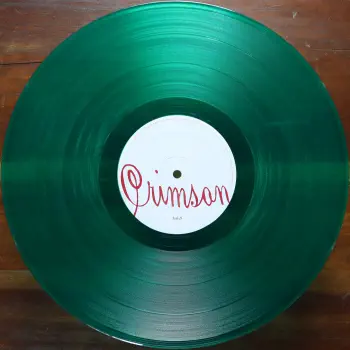 <u>PRESSING INFO</u><br><table class=inf_press><tbody><tr class=inf_info><td class=inf_title>Album:</td><td class=inf_info> Crimson on Clear Green | Clear Green  </td></tr>
    <td class=inf_title>Pressing:</td><td> Second Pressing /300+  </td></tr>
    <td class=inf_title>Release Date:</td><td> Dec. 15th 2009  </td></tr>
    <td class=inf_title>Album Pressed:</td><td> 2009  </td></tr>
    <td class=inf_title>Label:</td><td> Vagrant Records/Cobraside CSDLP1127  </td></tr>
    <td class=inf_title>Insert:</td><td> Double Sided Glossy  </td></tr>
    <td class=inf_title>Barcode:</td><td> 8 29707-95271 5  </td></tr>
    <td class=inf_title>Side A Matrix:</td><td> CSDLP-1127-A  </td></tr>
    <td class=inf_title>Side B Matrix:</td><td> CSDLP-1127-B  </td></tr>
    <td class=inf_title>Side C Matrix:</td><td> CSDLP-1127-C  </td></tr>
    <td class=inf_title>Side D Matrix:</td><td> CSDLP-1127-D  </td></tr>
    <td class=inf_title>&nbsp;</td><td> <a href=https://www.discogs.com/release/3302064 target=_blank rel=noopener noreferrer>View This Release on Discogs</a>  </tr></tbody></table>
<br><u>PRICING</u><span class='less' style='padding-left: 8px; color: var(--font-colour_grey);'>(prices shown in USD)</span><br><table class='inf_press'><tbody><tr class='inf_info'>
            <td class='inf_title'>Last Sold:</td>
            <td>$90.00 (Sep 9, 2025)</td>
            </tr><tr class='inf_info'>
            <td class='inf_title'>History:</td>
            <td>
                <span class='price-low' title='€15.99 · Sold on Jan 25, 2014'>Low: <span class='price-value'>$18.21</span></span>
                <span class='price-separator'>|</span>
                <span class='price-avg'>Avg: <span class='price-value'>$86.60</span></span>
                <span class='price-separator'>|</span>
                <span class='price-high' title='Sold on Dec 17, 2022'>High: <span class='price-value'>$150.00</span></span>
            </td>
            </tr></tbody></table><br>    <br><br><u>TRACKLIST</u><br><table class='inf_tracks'><tbody><tr>
            <td class='inf_num'>A1</td>
            <td class='inf_trk'>Time To Waste</td>
            <td class='inf_len'>4:11</td>
            <td><a href='#' class='lyric-link' data-album-code='crimson' data-song-title='Time To Waste'>Lyrics</a></td></tr><tr>
            <td class='inf_num'>A2</td>
            <td class='inf_trk'>The Poison</td>
            <td class='inf_len'>2:04</td>
            <td><a href='#' class='lyric-link' data-album-code='crimson' data-song-title='The Poison'>Lyrics</a></td></tr><tr>
            <td class='inf_num'>A3</td>
            <td class='inf_trk'>Burn</td>
            <td class='inf_len'>4:05</td>
            <td><a href='#' class='lyric-link' data-album-code='crimson' data-song-title='Burn'>Lyrics</a></td></tr><tr>
            <td class='inf_num'>B1</td>
            <td class='inf_trk'>Mercy Me</td>
            <td class='inf_len'>2:49</td>
            <td><a href='#' class='lyric-link' data-album-code='crimson' data-song-title='Mercy Me'>Lyrics</a></td></tr><tr>
            <td class='inf_num'>B2</td>
            <td class='inf_trk'>Dethbed</td>
            <td class='inf_len'>3:03</td>
            <td><a href='#' class='lyric-link' data-album-code='crimson' data-song-title='Dethbed'>Lyrics</a></td></tr><tr>
            <td class='inf_num'>B3</td>
            <td class='inf_trk'>Settle For Satin</td>
            <td class='inf_len'>3:49</td>
            <td><a href='#' class='lyric-link' data-album-code='crimson' data-song-title='Settle For Satin'>Lyrics</a></td></tr><tr>
            <td class='inf_num'>C1</td>
            <td class='inf_trk'>Sadie</td>
            <td class='inf_len'>4:39</td>
            <td><a href='#' class='lyric-link' data-album-code='crimson' data-song-title='Sadie'>Lyrics</a></td></tr><tr>
            <td class='inf_num'>C2</td>
            <td class='inf_trk'>Fall Victim</td>
            <td class='inf_len'>3:18</td>
            <td><a href='#' class='lyric-link' data-album-code='crimson' data-song-title='Fall Victim'>Lyrics</a></td></tr><tr>
            <td class='inf_num'>C3</td>
            <td class='inf_trk'>I Was A Prayer</td>
            <td class='inf_len'>2:36</td>
            <td><a href='#' class='lyric-link' data-album-code='crimson' data-song-title='I Was A Prayer'>Lyrics</a></td></tr><tr>
            <td class='inf_num'>D1</td>
            <td class='inf_trk'>Prevent This Tragedy</td>
            <td class='inf_len'>3:06</td>
            <td><a href='#' class='lyric-link' data-album-code='crimson' data-song-title='Prevent This Tragedy'>Lyrics</a></td></tr><tr>
            <td class='inf_num'>D2</td>
            <td class='inf_trk'>Back To Hell</td>
            <td class='inf_len'>2:54</td>
            <td><a href='#' class='lyric-link' data-album-code='crimson' data-song-title='Back To Hell'>Lyrics</a></td></tr><tr>
            <td class='inf_num'>D3</td>
            <td class='inf_trk'>Your Neck</td>
            <td class='inf_len'>3:15</td>
            <td><a href='#' class='lyric-link' data-album-code='crimson' data-song-title='Your Neck'>Lyrics</a></td></tr><tr>
            <td class='inf_num'>D4</td>
            <td class='inf_trk'>Smoke</td>
            <td class='inf_len'>2:59</td>
            <td><a href='#' class='lyric-link' data-album-code='crimson' data-song-title='Smoke'>Lyrics</a></td></tr></tbody></table><br><br>
    <u>NOTES</u><br> Matte NON gatefold sleeve. White A/B labels, Red C/D labels. Crimson's 2nd press was /1000 copies, divided into 7 different colour variants.
 - B