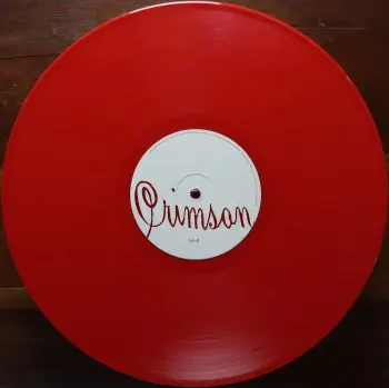 <u>PRESSING INFO</u><br><table class=inf_press><tbody><tr class=inf_info><td class=inf_title>Album:</td><td class=inf_info> Crimson on Red (UK Exclusive)  </td></tr>
    <td class=inf_title>Pressing:</td><td> First Pressing /1000  </td></tr>
    <td class=inf_title>Release Date:</td><td> 2005  </td></tr>
    <td class=inf_title>Album Pressed:</td><td> 2005  </td></tr>
    <td class=inf_title>Label:</td><td> Vagrant Records/Hassle Records VRUK012LP  </td></tr>
    <td class=inf_title>Insert:</td><td> Double Sided Glossy  </td></tr>
    <td class=inf_title>Barcode:</td><td> 5 060100-660288  </td></tr>
    <td class=inf_title>Side A Matrix:</td><td> VRUK-012-A-1  </td></tr>
    <td class=inf_title>Side B Matrix:</td><td> VRUK-012-B2  </td></tr>
    <td class=inf_title>&nbsp;</td><td> <a href=https://www.discogs.com/release/1293416 target=_blank rel=noopener noreferrer>View This Release on Discogs</a>  </tr></tbody></table>
<br><u>PRICING</u><span class='less' style='padding-left: 8px; color: var(--font-colour_grey);'>(prices shown in USD)</span><br><table class='inf_press'><tbody><tr class='inf_info'>
            <td class='inf_title'>Last Sold:</td>
            <td><span title='Sold for €80.00'>$91.11</span> (May 10, 2026)</td>
            </tr><tr class='inf_info'>
            <td class='inf_title'>History:</td>
            <td>
                <span class='price-low' title='£30.00 · Sold on Dec 28, 2018'>Low: <span class='price-value'>$39.95</span></span>
                <span class='price-separator'>|</span>
                <span class='price-avg'>Avg: <span class='price-value'>$105.96</span></span>
                <span class='price-separator'>|</span>
                <span class='price-high' title='€175.00 · Sold on Oct 13, 2025'>High: <span class='price-value'>$199.31</span></span>
            </td>
            </tr></tbody></table><br>    <br><br><u>TRACKLIST</u><br><table class='inf_tracks'><tbody><tr>
            <td class='inf_num'>A1</td>
            <td class='inf_trk'>Time To Waste</td>
            <td class='inf_len'>4:11</td>
            <td><a href='#' class='lyric-link' data-album-code='crimson' data-song-title='Time To Waste'>Lyrics</a></td></tr><tr>
            <td class='inf_num'>A2</td>
            <td class='inf_trk'>The Poison</td>
            <td class='inf_len'>2:04</td>
            <td><a href='#' class='lyric-link' data-album-code='crimson' data-song-title='The Poison'>Lyrics</a></td></tr><tr>
            <td class='inf_num'>A3</td>
            <td class='inf_trk'>Burn</td>
            <td class='inf_len'>4:05</td>
            <td><a href='#' class='lyric-link' data-album-code='crimson' data-song-title='Burn'>Lyrics</a></td></tr><tr>
            <td class='inf_num'>A4</td>
            <td class='inf_trk'>Mercy Me</td>
            <td class='inf_len'>2:49</td>
            <td><a href='#' class='lyric-link' data-album-code='crimson' data-song-title='Mercy Me'>Lyrics</a></td></tr><tr>
            <td class='inf_num'>A5</td>
            <td class='inf_trk'>Dethbed</td>
            <td class='inf_len'>3:03</td>
            <td><a href='#' class='lyric-link' data-album-code='crimson' data-song-title='Dethbed'>Lyrics</a></td></tr><tr>
            <td class='inf_num'>A6</td>
            <td class='inf_trk'>Settle For Satin</td>
            <td class='inf_len'>3:49</td>
            <td><a href='#' class='lyric-link' data-album-code='crimson' data-song-title='Settle For Satin'>Lyrics</a></td></tr><tr>
            <td class='inf_num'>A7</td>
            <td class='inf_trk'>Sadie</td>
            <td class='inf_len'>4:39</td>
            <td><a href='#' class='lyric-link' data-album-code='crimson' data-song-title='Sadie'>Lyrics</a></td></tr><tr>
            <td class='inf_num'>B1</td>
            <td class='inf_trk'>Fall Victim</td>
            <td class='inf_len'>3:18</td>
            <td><a href='#' class='lyric-link' data-album-code='crimson' data-song-title='Fall Victim'>Lyrics</a></td></tr><tr>
            <td class='inf_num'>B2</td>
            <td class='inf_trk'>I Was A Prayer</td>
            <td class='inf_len'>2:36</td>
            <td><a href='#' class='lyric-link' data-album-code='crimson' data-song-title='I Was A Prayer'>Lyrics</a></td></tr><tr>
            <td class='inf_num'>B3</td>
            <td class='inf_trk'>Prevent This Tragedy</td>
            <td class='inf_len'>3:06</td>
            <td><a href='#' class='lyric-link' data-album-code='crimson' data-song-title='Prevent This Tragedy'>Lyrics</a></td></tr><tr>
            <td class='inf_num'>B4</td>
            <td class='inf_trk'>Back To Hell</td>
            <td class='inf_len'>2:54</td>
            <td><a href='#' class='lyric-link' data-album-code='crimson' data-song-title='Back To Hell'>Lyrics</a></td></tr><tr>
            <td class='inf_num'>B5</td>
            <td class='inf_trk'>Your Neck</td>
            <td class='inf_len'>3:15</td>
            <td><a href='#' class='lyric-link' data-album-code='crimson' data-song-title='Your Neck'>Lyrics</a></td></tr><tr>
            <td class='inf_num'>B6</td>
            <td class='inf_trk'>Smoke</td>
            <td class='inf_len'>2:59</td>
            <td><a href='#' class='lyric-link' data-album-code='crimson' data-song-title='Smoke'>Lyrics</a></td></tr></tbody></table><br><br>
    <u>NOTES</u><br> Double sided glossy insert. Matte finish cover with Limited Crimson Coloured Vinyl hype sticker. Vagrant/Hassle markings on cover. Made in Holland sticker.
 - B