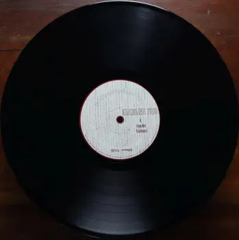 <u>PRESSING INFO</u><br><table class=inf_press><tbody><tr class=inf_info><td class=inf_title>Album:</td><td class=inf_info> From Here To Infirmary on Black (10th Anniversary)  </td></tr>
    <td class=inf_title>Pressing:</td><td> Second Pressing /??  </td></tr>
    <td class=inf_title>Release Date:</td><td> Nov. 15th 2011  </td></tr>
    <td class=inf_title>Album Pressed:</td><td> 2011  </td></tr>
    <td class=inf_title>Label:</td><td> Vagrant Records/Cobraside Distribution CSDLP 1156  </td></tr>
    <td class=inf_title>Insert:</td><td> Double Sided Glossy  </td></tr>
    <td class=inf_title>Barcode:</td><td> 8 29707 95561 7  </td></tr>
    <td class=inf_title>Side A Matrix:</td><td> CSDLP-1156-A  </td></tr>
    <td class=inf_title>Side B Matrix:</td><td> CSDLP-1156-B  </td></tr>
    <td class=inf_title>&nbsp;</td><td> <a href=https://www.discogs.com/release/3842461 target=_blank rel=noopener noreferrer>View This Release on Discogs</a>  </tr></tbody></table>
<br><u>PRICING</u><span class='less' style='padding-left: 8px; color: var(--font-colour_grey);'>(prices shown in USD)</span><br><table class='inf_press'><tbody><tr class='inf_info'>
            <td class='inf_title'>Last Sold:</td>
            <td>$45.00 (Jun 19, 2026)</td>
            </tr><tr class='inf_info'>
            <td class='inf_title'>History:</td>
            <td>
                <span class='price-low' title='€14.00 · Sold on Aug 18, 2019'>Low: <span class='price-value'>$15.94</span></span>
                <span class='price-separator'>|</span>
                <span class='price-avg'>Avg: <span class='price-value'>$31.49</span></span>
                <span class='price-separator'>|</span>
                <span class='price-high' title='£75.00 · Sold on Jul 13, 2021'>High: <span class='price-value'>$99.87</span></span>
            </td>
            </tr></tbody></table><br>    <br><br><u>TRACKLIST</u><br><table class='inf_tracks'><tbody><tr>
            <td class='inf_num'>A1</td>
            <td class='inf_trk'>Private Eye</td>
            <td class='inf_len'>3:30</td>
            <td><a href='#' class='lyric-link' data-album-code='fhti' data-song-title='Private Eye'>Lyrics</a></td></tr><tr>
            <td class='inf_num'>A2</td>
            <td class='inf_trk'>Mr. Chainsaw</td>
            <td class='inf_len'>3:05</td>
            <td><a href='#' class='lyric-link' data-album-code='fhti' data-song-title='Mr. Chainsaw'>Lyrics</a></td></tr><tr>
            <td class='inf_num'>A3</td>
            <td class='inf_trk'>Take Lots With Alcohol</td>
            <td class='inf_len'>3:13</td>
            <td><a href='#' class='lyric-link' data-album-code='fhti' data-song-title='Take Lots With Alcohol'>Lyrics</a></td></tr><tr>
            <td class='inf_num'>A4</td>
            <td class='inf_trk'>Stupid Kid</td>
            <td class='inf_len'>2:23</td>
            <td><a href='#' class='lyric-link' data-album-code='fhti' data-song-title='Stupid Kid'>Lyrics</a></td></tr><tr>
            <td class='inf_num'>A5</td>
            <td class='inf_trk'>Another Innocent Girl</td>
            <td class='inf_len'>3:37</td>
            <td><a href='#' class='lyric-link' data-album-code='fhti' data-song-title='Another Innocent Girl'>Lyrics</a></td></tr><tr>
            <td class='inf_num'>A6</td>
            <td class='inf_trk'>Steamer Trunk</td>
            <td class='inf_len'>2:50</td>
            <td><a href='#' class='lyric-link' data-album-code='fhti' data-song-title='Steamer Trunk'>Lyrics</a></td></tr><tr>
            <td class='inf_num'>B1</td>
            <td class='inf_trk'>You’re Dead</td>
            <td class='inf_len'>3:50</td>
            <td><a href='#' class='lyric-link' data-album-code='fhti' data-song-title='You’re Dead'>Lyrics</a></td></tr><tr>
            <td class='inf_num'>B2</td>
            <td class='inf_trk'>Armageddon</td>
            <td class='inf_len'>2:49</td>
            <td><a href='#' class='lyric-link' data-album-code='fhti' data-song-title='Armageddon'>Lyrics</a></td></tr><tr>
            <td class='inf_num'>B3</td>
            <td class='inf_trk'>I’m Dying Tomorrow</td>
            <td class='inf_len'>2:18</td>
            <td><a href='#' class='lyric-link' data-album-code='fhti' data-song-title='I’m Dying Tomorrow'>Lyrics</a></td></tr><tr>
            <td class='inf_num'>B4</td>
            <td class='inf_trk'>Bloodied Up</td>
            <td class='inf_len'>2:51</td>
            <td><a href='#' class='lyric-link' data-album-code='fhti' data-song-title='Bloodied Up'>Lyrics</a></td></tr><tr>
            <td class='inf_num'>B5</td>
            <td class='inf_trk'>Trucks And Trains</td>
            <td class='inf_len'>3:16</td>
            <td><a href='#' class='lyric-link' data-album-code='fhti' data-song-title='Trucks And Trains'>Lyrics</a></td></tr><tr>
            <td class='inf_num'>B6</td>
            <td class='inf_trk'>Crawl</td>
            <td class='inf_len'>4:25</td>
            <td><a href='#' class='lyric-link' data-album-code='fhti' data-song-title='Crawl'>Lyrics</a></td></tr></tbody></table><br><br>
    <u>NOTES</u><br> This pressing was released on Record Store Day 2011 for the 10th Anniversary Release of this album.
 - B