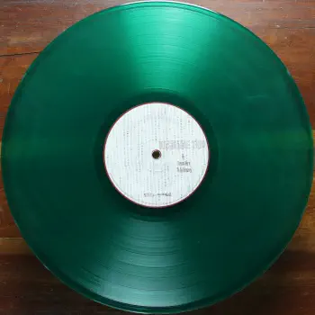 <u>PRESSING INFO</u><br><table class=inf_press><tbody><tr class=inf_info><td class=inf_title>Album:</td><td class=inf_info> From Here To Infirmary on Translucent Green  </td></tr>
    <td class=inf_title>Pressing:</td><td> Second Pressing /200-300  </td></tr>
    <td class=inf_title>Release Date:</td><td> Nov. 15th 2011  </td></tr>
    <td class=inf_title>Album Pressed:</td><td> 2011  </td></tr>
    <td class=inf_title>Label:</td><td> Vagrant Records/Cobraside Distribution CSDLP 1156  </td></tr>
    <td class=inf_title>Insert:</td><td> Double Sided Glossy  </td></tr>
    <td class=inf_title>Barcode:</td><td> 8 29707-95561 7  </td></tr>
    <td class=inf_title>Side A Matrix:</td><td> CSDLP-1156-A  </td></tr>
    <td class=inf_title>Side B Matrix:</td><td> CSDLP-1156-B  </td></tr>
    <td class=inf_title>&nbsp;</td><td> <a href=https://www.discogs.com/release/3433206 target=_blank rel=noopener noreferrer>View This Release on Discogs</a>  </tr></tbody></table>
<br><u>PRICING</u><span class='less' style='padding-left: 8px; color: var(--font-colour_grey);'>(prices shown in USD)</span><br><table class='inf_press'><tbody><tr class='inf_info'>
            <td class='inf_title'>Last Sold:</td>
            <td>$30.00 (Jul 9, 2026)</td>
            </tr><tr class='inf_info'>
            <td class='inf_title'>History:</td>
            <td>
                <span class='price-low' title='Sold on May 19, 2016'>Low: <span class='price-value'>$20.00</span></span>
                <span class='price-separator'>|</span>
                <span class='price-avg'>Avg: <span class='price-value'>$36.98</span></span>
                <span class='price-separator'>|</span>
                <span class='price-high' title='Sold on Apr 13, 2021'>High: <span class='price-value'>$115.00</span></span>
            </td>
            </tr></tbody></table><br>    <br><br><u>TRACKLIST</u><br><table class='inf_tracks'><tbody><tr>
            <td class='inf_num'>A1</td>
            <td class='inf_trk'>Private Eye</td>
            <td class='inf_len'>3:30</td>
            <td><a href='#' class='lyric-link' data-album-code='fhti' data-song-title='Private Eye'>Lyrics</a></td></tr><tr>
            <td class='inf_num'>A2</td>
            <td class='inf_trk'>Mr. Chainsaw</td>
            <td class='inf_len'>3:05</td>
            <td><a href='#' class='lyric-link' data-album-code='fhti' data-song-title='Mr. Chainsaw'>Lyrics</a></td></tr><tr>
            <td class='inf_num'>A3</td>
            <td class='inf_trk'>Take Lots With Alcohol</td>
            <td class='inf_len'>3:13</td>
            <td><a href='#' class='lyric-link' data-album-code='fhti' data-song-title='Take Lots With Alcohol'>Lyrics</a></td></tr><tr>
            <td class='inf_num'>A4</td>
            <td class='inf_trk'>Stupid Kid</td>
            <td class='inf_len'>2:23</td>
            <td><a href='#' class='lyric-link' data-album-code='fhti' data-song-title='Stupid Kid'>Lyrics</a></td></tr><tr>
            <td class='inf_num'>A5</td>
            <td class='inf_trk'>Another Innocent Girl</td>
            <td class='inf_len'>3:37</td>
            <td><a href='#' class='lyric-link' data-album-code='fhti' data-song-title='Another Innocent Girl'>Lyrics</a></td></tr><tr>
            <td class='inf_num'>A6</td>
            <td class='inf_trk'>Steamer Trunk</td>
            <td class='inf_len'>2:50</td>
            <td><a href='#' class='lyric-link' data-album-code='fhti' data-song-title='Steamer Trunk'>Lyrics</a></td></tr><tr>
            <td class='inf_num'>B1</td>
            <td class='inf_trk'>You’re Dead</td>
            <td class='inf_len'>3:50</td>
            <td><a href='#' class='lyric-link' data-album-code='fhti' data-song-title='You’re Dead'>Lyrics</a></td></tr><tr>
            <td class='inf_num'>B2</td>
            <td class='inf_trk'>Armageddon</td>
            <td class='inf_len'>2:49</td>
            <td><a href='#' class='lyric-link' data-album-code='fhti' data-song-title='Armageddon'>Lyrics</a></td></tr><tr>
            <td class='inf_num'>B3</td>
            <td class='inf_trk'>I’m Dying Tomorrow</td>
            <td class='inf_len'>2:18</td>
            <td><a href='#' class='lyric-link' data-album-code='fhti' data-song-title='I’m Dying Tomorrow'>Lyrics</a></td></tr><tr>
            <td class='inf_num'>B4</td>
            <td class='inf_trk'>Bloodied Up</td>
            <td class='inf_len'>2:51</td>
            <td><a href='#' class='lyric-link' data-album-code='fhti' data-song-title='Bloodied Up'>Lyrics</a></td></tr><tr>
            <td class='inf_num'>B5</td>
            <td class='inf_trk'>Trucks And Trains</td>
            <td class='inf_len'>3:16</td>
            <td><a href='#' class='lyric-link' data-album-code='fhti' data-song-title='Trucks And Trains'>Lyrics</a></td></tr><tr>
            <td class='inf_num'>B6</td>
            <td class='inf_trk'>Crawl</td>
            <td class='inf_len'>4:25</td>
            <td><a href='#' class='lyric-link' data-album-code='fhti' data-song-title='Crawl'>Lyrics</a></td></tr></tbody></table><br><br>
    <u>NOTES</u><br> These 2nd pressings of From Here To Infirmary mark the first time that Cobraside Distribution was in charge of pressing Alkaline Trio vinyl. <a href='https://web.archive.org/web/20130507070837/http://www.shopradiocast.com/products/Alkaline-Trio-%252d-From-Here-To-Infirmary-LP-%28Colored%29.html'>They claim that there were 200 copies TOTAL on 'mixed vinyl'</a>. Many other sources online at the time claim the number was actually /300. The actual number is unknown, and it is unknown how many of each mixed colour are actually out there.
 - B