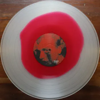 <u>PRESSING INFO</u><br><table class=inf_press><tbody><tr class=inf_info><td class=inf_title>Album:</td><td class=inf_info> Goddamnit Redux on Clear with Magenta Blood Drop (1-2-3-4 Go! Records Exclusive)  </td></tr>
    <td class=inf_title>Pressing:</td><td> Twentieth Pressing /1000  </td></tr>
    <td class=inf_title>Release Date:</td><td> Mar. 15th 2023  </td></tr>
    <td class=inf_title>Album Pressed:</td><td> 2023  </td></tr>
    <td class=inf_title>Label:</td><td> Asianman Records AM-160  </td></tr>
    <td class=inf_title>Insert:</td><td> Double Sided Glossy  </td></tr>
    <td class=inf_title>Barcode:</td><td> 6 12851-01601 9  </td></tr>
    <td class=inf_title>Side A Matrix:</td><td> PIRATES PRESS - AM 034 A 182022E1/B  </td></tr>
    <td class=inf_title>Side B Matrix:</td><td> PIRATES PRESS - AM 034 B 182022E2/C  </td></tr>
    <td class=inf_title>&nbsp;</td><td> <a href=https://www.discogs.com/release/26598896-Alkaline-Trio-Goddamnit target=_blank rel=noopener noreferrer>View This Release on Discogs</a>  </tr></tbody></table>
<br><u>PRICING</u><span class='less' style='padding-left: 8px; color: var(--font-colour_grey);'>(prices shown in USD)</span><br><table class='inf_press'><tbody><tr class='inf_info'>
            <td class='inf_title'>Last Sold:</td>
            <td>$25.99 (Jun 26, 2026)</td>
            </tr><tr class='inf_info'>
            <td class='inf_title'>History:</td>
            <td>
                <span class='price-low' title='Sold on Jun 2, 2025'>Low: <span class='price-value'>$17.00</span></span>
                <span class='price-separator'>|</span>
                <span class='price-avg'>Avg: <span class='price-value'>$27.04</span></span>
                <span class='price-separator'>|</span>
                <span class='price-high' title='€36.00 · Sold on Mar 2, 2025'>High: <span class='price-value'>$41.00</span></span>
            </td>
            </tr></tbody></table><br>    <br><br><u>TRACKLIST</u><br><table class='inf_tracks'><tbody><tr>
            <td class='inf_num'>A1</td>
            <td class='inf_trk'>Cringe</td>
            <td class='inf_len'>2:23</td>
            <td><a href='#' class='lyric-link' data-album-code='gd' data-song-title='Cringe'>Lyrics</a></td></tr><tr>
            <td class='inf_num'>A2</td>
            <td class='inf_trk'>Cop</td>
            <td class='inf_len'>2:18</td>
            <td><a href='#' class='lyric-link' data-album-code='gd' data-song-title='Cop'>Lyrics</a></td></tr><tr>
            <td class='inf_num'>A3</td>
            <td class='inf_trk'>San Francisco</td>
            <td class='inf_len'>3:52</td>
            <td><a href='#' class='lyric-link' data-album-code='gd' data-song-title='San Francisco'>Lyrics</a></td></tr><tr>
            <td class='inf_num'>A4</td>
            <td class='inf_trk'>Nose Over Tail</td>
            <td class='inf_len'>2:37</td>
            <td><a href='#' class='lyric-link' data-album-code='gd' data-song-title='Nose Over Tail'>Lyrics</a></td></tr><tr>
            <td class='inf_num'>A5</td>
            <td class='inf_trk'>As You Were</td>
            <td class='inf_len'>2:11</td>
            <td><a href='#' class='lyric-link' data-album-code='gd' data-song-title='As You Were'>Lyrics</a></td></tr><tr>
            <td class='inf_num'>A6</td>
            <td class='inf_trk'>Enjoy Your Day</td>
            <td class='inf_len'>2:17</td>
            <td><a href='#' class='lyric-link' data-album-code='gd' data-song-title='Enjoy Your Day'>Lyrics</a></td></tr><tr>
            <td class='inf_num'>A7</td>
            <td class='inf_trk'>Clavicle</td>
            <td class='inf_len'>2:28</td>
            <td><a href='#' class='lyric-link' data-album-code='gd' data-song-title='Clavicle'>Lyrics</a></td></tr><tr>
            <td class='inf_num'>B1</td>
            <td class='inf_trk'>My Little Needle</td>
            <td class='inf_len'>3:01</td>
            <td><a href='#' class='lyric-link' data-album-code='gd' data-song-title='My Little Needle'>Lyrics</a></td></tr><tr>
            <td class='inf_num'>B2</td>
            <td class='inf_trk'>Southern Rock</td>
            <td class='inf_len'>3:05</td>
            <td><a href='#' class='lyric-link' data-album-code='gd' data-song-title='Southern Rock'>Lyrics</a></td></tr><tr>
            <td class='inf_num'>B3</td>
            <td class='inf_trk'>Message From Kathlene</td>
            <td class='inf_len'>3:22</td>
            <td><a href='#' class='lyric-link' data-album-code='gd' data-song-title='Message From Kathlene'>Lyrics</a></td></tr><tr>
            <td class='inf_num'>B4</td>
            <td class='inf_trk'>Trouble Breathing</td>
            <td class='inf_len'>3:55</td>
            <td><a href='#' class='lyric-link' data-album-code='gd' data-song-title='Trouble Breathing'>Lyrics</a></td></tr><tr>
            <td class='inf_num'>B5</td>
            <td class='inf_trk'>Sorry About That</td>
            <td class='inf_len'>3:21</td>
            <td><a href='#' class='lyric-link' data-album-code='gd' data-song-title='Sorry About That'>Lyrics</a></td></tr></tbody></table><br><br>
    <u>NOTES</u><br> The insert has a thin white border, and the former DVD order form is now covered by Heart/Skull logos. Center labels are Clock/Skiba again. This release has the original Goddamnit catalog number stamped in the runout (AM 034) instead of the correct AM-160. This is the remastered Redux version. The sleeve of this release has a flat finish, compared to previous pressings that had glossy features.
 - B