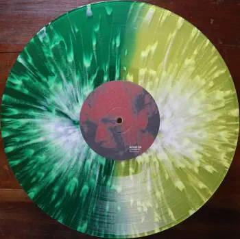 <u>PRESSING INFO</u><br><table class=inf_press><tbody><tr class=inf_info><td class=inf_title>Album:</td><td class=inf_info> Goddamnit Redux on Half Green / Half Yellow with White Splatter  </td></tr>
    <td class=inf_title>Pressing:</td><td> First Pressing /500  </td></tr>
    <td class=inf_title>Release Date:</td><td> Mar. 11th 2008  </td></tr>
    <td class=inf_title>Album Pressed:</td><td> 2008  </td></tr>
    <td class=inf_title>Label:</td><td> Asianman Records AM-160  </td></tr>
    <td class=inf_title>Insert:</td><td> Double Sided Glossy  </td></tr>
    <td class=inf_title>Barcode:</td><td> 6 12851-01601 9  </td></tr>
    <td class=inf_title>Side A Matrix:</td><td> 74940E1/B GOD  </td></tr>
    <td class=inf_title>Side B Matrix:</td><td> 74940E2/A DAMNIT!  </td></tr>
    <td class=inf_title>&nbsp;</td><td> <a href=https://www.discogs.com/release/2465168-Alkaline-Trio-Goddamnit target=_blank rel=noopener noreferrer>View This Release on Discogs</a>  </tr></tbody></table>
<br><u>PRICING</u><span class='less' style='padding-left: 8px; color: var(--font-colour_grey);'>(prices shown in USD)</span><br><table class='inf_press'><tbody><tr class='inf_info'>
            <td class='inf_title'>Last Sold:</td>
            <td>$50.00 (Aug 13, 2021)</td>
            </tr><tr class='inf_info'>
            <td class='inf_title'>History:</td>
            <td>
                <span class='price-low' title='Sold on Jul 22, 2016'>Low: <span class='price-value'>$15.00</span></span>
                <span class='price-separator'>|</span>
                <span class='price-avg'>Avg: <span class='price-value'>$31.42</span></span>
                <span class='price-separator'>|</span>
                <span class='price-high' title='€44.00 · Sold on Jul 19, 2020'>High: <span class='price-value'>$50.11</span></span>
            </td>
            </tr></tbody></table><br>    <br><br><u>TRACKLIST</u><br><table class='inf_tracks'><tbody><tr>
            <td class='inf_num'>A1</td>
            <td class='inf_trk'>Cringe</td>
            <td class='inf_len'>2:23</td>
            <td><a href='#' class='lyric-link' data-album-code='gd' data-song-title='Cringe'>Lyrics</a></td></tr><tr>
            <td class='inf_num'>A2</td>
            <td class='inf_trk'>Cop</td>
            <td class='inf_len'>2:18</td>
            <td><a href='#' class='lyric-link' data-album-code='gd' data-song-title='Cop'>Lyrics</a></td></tr><tr>
            <td class='inf_num'>A3</td>
            <td class='inf_trk'>San Francisco</td>
            <td class='inf_len'>3:52</td>
            <td><a href='#' class='lyric-link' data-album-code='gd' data-song-title='San Francisco'>Lyrics</a></td></tr><tr>
            <td class='inf_num'>A4</td>
            <td class='inf_trk'>Nose Over Tail</td>
            <td class='inf_len'>2:37</td>
            <td><a href='#' class='lyric-link' data-album-code='gd' data-song-title='Nose Over Tail'>Lyrics</a></td></tr><tr>
            <td class='inf_num'>A5</td>
            <td class='inf_trk'>As You Were</td>
            <td class='inf_len'>2:11</td>
            <td><a href='#' class='lyric-link' data-album-code='gd' data-song-title='As You Were'>Lyrics</a></td></tr><tr>
            <td class='inf_num'>A6</td>
            <td class='inf_trk'>Enjoy Your Day</td>
            <td class='inf_len'>2:17</td>
            <td><a href='#' class='lyric-link' data-album-code='gd' data-song-title='Enjoy Your Day'>Lyrics</a></td></tr><tr>
            <td class='inf_num'>A7</td>
            <td class='inf_trk'>Clavicle</td>
            <td class='inf_len'>2:28</td>
            <td><a href='#' class='lyric-link' data-album-code='gd' data-song-title='Clavicle'>Lyrics</a></td></tr><tr>
            <td class='inf_num'>B1</td>
            <td class='inf_trk'>My Little Needle</td>
            <td class='inf_len'>3:01</td>
            <td><a href='#' class='lyric-link' data-album-code='gd' data-song-title='My Little Needle'>Lyrics</a></td></tr><tr>
            <td class='inf_num'>B2</td>
            <td class='inf_trk'>Southern Rock</td>
            <td class='inf_len'>3:05</td>
            <td><a href='#' class='lyric-link' data-album-code='gd' data-song-title='Southern Rock'>Lyrics</a></td></tr><tr>
            <td class='inf_num'>B3</td>
            <td class='inf_trk'>Message From Kathlene</td>
            <td class='inf_len'>3:22</td>
            <td><a href='#' class='lyric-link' data-album-code='gd' data-song-title='Message From Kathlene'>Lyrics</a></td></tr><tr>
            <td class='inf_num'>B4</td>
            <td class='inf_trk'>Trouble Breathing</td>
            <td class='inf_len'>3:55</td>
            <td><a href='#' class='lyric-link' data-album-code='gd' data-song-title='Trouble Breathing'>Lyrics</a></td></tr><tr>
            <td class='inf_num'>B5</td>
            <td class='inf_trk'>Sorry About That</td>
            <td class='inf_len'>3:21</td>
            <td><a href='#' class='lyric-link' data-album-code='gd' data-song-title='Sorry About That'>Lyrics</a></td></tr></tbody></table><br><br>
    <u>NOTES</u><br> This 1st pressing has a matte cover but the lettering and clocks on the front, as well as the track titles and Heart & Skull logo on the back, have a glossy finish.
 - B