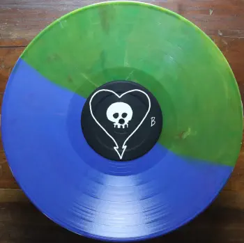 <u>PRESSING INFO</u><br><table class=inf_press><tbody><tr class=inf_info><td class=inf_title>Album:</td><td class=inf_info> Goddamnit Redux on Random Colour 'Half Translucent Green / Half Blue'  </td></tr>
    <td class=inf_title>Pressing:</td><td> Twenty-Second Pressing /1000  </td></tr>
    <td class=inf_title>Release Date:</td><td> May 13th 2024  </td></tr>
    <td class=inf_title>Album Pressed:</td><td> 2024  </td></tr>
    <td class=inf_title>Label:</td><td> Asianman Records AM-160  </td></tr>
    <td class=inf_title>Insert:</td><td> Double Sided Glossy  </td></tr>
    <td class=inf_title>Barcode:</td><td> 6 12851-01601 9  </td></tr>
    <td class=inf_title>Side A Matrix:</td><td> [etched] AM-160-A S-65748 [stamped] GOLDEN  </td></tr>
    <td class=inf_title>Side B Matrix:</td><td> [etched] AM-160-B S-65749 [stamped] GOLDEN  </td></tr>
    <td class=inf_title>&nbsp;</td><td> <a href=https://www.discogs.com/release/30789558-Alkaline-Trio-Goddamnit target=_blank rel=noopener noreferrer>View This Release on Discogs</a>  </tr></tbody></table>
<br><u>PRICING</u><span class='less' style='padding-left: 8px; color: var(--font-colour_grey);'>(prices shown in USD)</span><br><table class='inf_press'><tbody><tr class='inf_info'>
            <td class='inf_title'>Last Sold:</td>
            <td>$19.98 (Dec 25, 2025)</td>
            </tr><tr class='inf_info'>
            <td class='inf_title'>History:</td>
            <td>
                <span class='price-low' title='Sold on Dec 17, 2024'>Low: <span class='price-value'>$17.98</span></span>
                <span class='price-separator'>|</span>
                <span class='price-avg'>Avg: <span class='price-value'>$19.77</span></span>
                <span class='price-separator'>|</span>
                <span class='price-high' title='Sold on May 7, 2025'>High: <span class='price-value'>$22.00</span></span>
            </td>
            </tr></tbody></table><br>    <br><br><u>TRACKLIST</u><br><table class='inf_tracks'><tbody><tr>
            <td class='inf_num'>A1</td>
            <td class='inf_trk'>Cringe</td>
            <td class='inf_len'>2:23</td>
            <td><a href='#' class='lyric-link' data-album-code='gd' data-song-title='Cringe'>Lyrics</a></td></tr><tr>
            <td class='inf_num'>A2</td>
            <td class='inf_trk'>Cop</td>
            <td class='inf_len'>2:18</td>
            <td><a href='#' class='lyric-link' data-album-code='gd' data-song-title='Cop'>Lyrics</a></td></tr><tr>
            <td class='inf_num'>A3</td>
            <td class='inf_trk'>San Francisco</td>
            <td class='inf_len'>3:52</td>
            <td><a href='#' class='lyric-link' data-album-code='gd' data-song-title='San Francisco'>Lyrics</a></td></tr><tr>
            <td class='inf_num'>A4</td>
            <td class='inf_trk'>Nose Over Tail</td>
            <td class='inf_len'>2:37</td>
            <td><a href='#' class='lyric-link' data-album-code='gd' data-song-title='Nose Over Tail'>Lyrics</a></td></tr><tr>
            <td class='inf_num'>A5</td>
            <td class='inf_trk'>As You Were</td>
            <td class='inf_len'>2:11</td>
            <td><a href='#' class='lyric-link' data-album-code='gd' data-song-title='As You Were'>Lyrics</a></td></tr><tr>
            <td class='inf_num'>A6</td>
            <td class='inf_trk'>Enjoy Your Day</td>
            <td class='inf_len'>2:17</td>
            <td><a href='#' class='lyric-link' data-album-code='gd' data-song-title='Enjoy Your Day'>Lyrics</a></td></tr><tr>
            <td class='inf_num'>A7</td>
            <td class='inf_trk'>Clavicle</td>
            <td class='inf_len'>2:28</td>
            <td><a href='#' class='lyric-link' data-album-code='gd' data-song-title='Clavicle'>Lyrics</a></td></tr><tr>
            <td class='inf_num'>B1</td>
            <td class='inf_trk'>My Little Needle</td>
            <td class='inf_len'>3:01</td>
            <td><a href='#' class='lyric-link' data-album-code='gd' data-song-title='My Little Needle'>Lyrics</a></td></tr><tr>
            <td class='inf_num'>B2</td>
            <td class='inf_trk'>Southern Rock</td>
            <td class='inf_len'>3:05</td>
            <td><a href='#' class='lyric-link' data-album-code='gd' data-song-title='Southern Rock'>Lyrics</a></td></tr><tr>
            <td class='inf_num'>B3</td>
            <td class='inf_trk'>Message From Kathlene</td>
            <td class='inf_len'>3:22</td>
            <td><a href='#' class='lyric-link' data-album-code='gd' data-song-title='Message From Kathlene'>Lyrics</a></td></tr><tr>
            <td class='inf_num'>B4</td>
            <td class='inf_trk'>Trouble Breathing</td>
            <td class='inf_len'>3:55</td>
            <td><a href='#' class='lyric-link' data-album-code='gd' data-song-title='Trouble Breathing'>Lyrics</a></td></tr><tr>
            <td class='inf_num'>B5</td>
            <td class='inf_trk'>Sorry About That</td>
            <td class='inf_len'>3:21</td>
            <td><a href='#' class='lyric-link' data-album-code='gd' data-song-title='Sorry About That'>Lyrics</a></td></tr></tbody></table><br><br>
    <u>NOTES</u><br> Thin white border around insert. Former DVD order form is now covered by Heart/Skull logos. Center labels are black Heart/Skull logos.
 - B