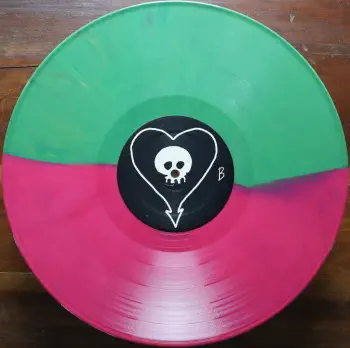 <u>PRESSING INFO</u><br><table class=inf_press><tbody><tr class=inf_info><td class=inf_title>Album:</td><td class=inf_info> Goddamnit Redux on Random Colour 'Half Green / Half Pink'  </td></tr>
    <td class=inf_title>Pressing:</td><td> Twenty-Second Pressing /1000  </td></tr>
    <td class=inf_title>Release Date:</td><td> May 13th 2024  </td></tr>
    <td class=inf_title>Album Pressed:</td><td> 2024  </td></tr>
    <td class=inf_title>Label:</td><td> Asianman Records AM-160  </td></tr>
    <td class=inf_title>Insert:</td><td> Double Sided Glossy  </td></tr>
    <td class=inf_title>Barcode:</td><td> 6 12851-01601 9  </td></tr>
    <td class=inf_title>Side A Matrix:</td><td> [etched] AM-160-A S-65748 [stamped] GOLDEN  </td></tr>
    <td class=inf_title>Side B Matrix:</td><td> [etched] AM-160-B S-65749 [stamped] GOLDEN  </td></tr>
    <td class=inf_title>&nbsp;</td><td> <a href=https://www.discogs.com/release/30789558-Alkaline-Trio-Goddamnit target=_blank rel=noopener noreferrer>View This Release on Discogs</a>  </tr></tbody></table>
<br><u>PRICING</u><span class='less' style='padding-left: 8px; color: var(--font-colour_grey);'>(prices shown in USD)</span><br><table class='inf_press'><tbody><tr class='inf_info'>
            <td class='inf_title'>Last Sold:</td>
            <td>$19.98 (Dec 25, 2025)</td>
            </tr><tr class='inf_info'>
            <td class='inf_title'>History:</td>
            <td>
                <span class='price-low' title='Sold on Dec 17, 2024'>Low: <span class='price-value'>$17.98</span></span>
                <span class='price-separator'>|</span>
                <span class='price-avg'>Avg: <span class='price-value'>$19.77</span></span>
                <span class='price-separator'>|</span>
                <span class='price-high' title='Sold on May 7, 2025'>High: <span class='price-value'>$22.00</span></span>
            </td>
            </tr></tbody></table><br>    <br><br><u>TRACKLIST</u><br><table class='inf_tracks'><tbody><tr>
            <td class='inf_num'>A1</td>
            <td class='inf_trk'>Cringe</td>
            <td class='inf_len'>2:23</td>
            <td><a href='#' class='lyric-link' data-album-code='gd' data-song-title='Cringe'>Lyrics</a></td></tr><tr>
            <td class='inf_num'>A2</td>
            <td class='inf_trk'>Cop</td>
            <td class='inf_len'>2:18</td>
            <td><a href='#' class='lyric-link' data-album-code='gd' data-song-title='Cop'>Lyrics</a></td></tr><tr>
            <td class='inf_num'>A3</td>
            <td class='inf_trk'>San Francisco</td>
            <td class='inf_len'>3:52</td>
            <td><a href='#' class='lyric-link' data-album-code='gd' data-song-title='San Francisco'>Lyrics</a></td></tr><tr>
            <td class='inf_num'>A4</td>
            <td class='inf_trk'>Nose Over Tail</td>
            <td class='inf_len'>2:37</td>
            <td><a href='#' class='lyric-link' data-album-code='gd' data-song-title='Nose Over Tail'>Lyrics</a></td></tr><tr>
            <td class='inf_num'>A5</td>
            <td class='inf_trk'>As You Were</td>
            <td class='inf_len'>2:11</td>
            <td><a href='#' class='lyric-link' data-album-code='gd' data-song-title='As You Were'>Lyrics</a></td></tr><tr>
            <td class='inf_num'>A6</td>
            <td class='inf_trk'>Enjoy Your Day</td>
            <td class='inf_len'>2:17</td>
            <td><a href='#' class='lyric-link' data-album-code='gd' data-song-title='Enjoy Your Day'>Lyrics</a></td></tr><tr>
            <td class='inf_num'>A7</td>
            <td class='inf_trk'>Clavicle</td>
            <td class='inf_len'>2:28</td>
            <td><a href='#' class='lyric-link' data-album-code='gd' data-song-title='Clavicle'>Lyrics</a></td></tr><tr>
            <td class='inf_num'>B1</td>
            <td class='inf_trk'>My Little Needle</td>
            <td class='inf_len'>3:01</td>
            <td><a href='#' class='lyric-link' data-album-code='gd' data-song-title='My Little Needle'>Lyrics</a></td></tr><tr>
            <td class='inf_num'>B2</td>
            <td class='inf_trk'>Southern Rock</td>
            <td class='inf_len'>3:05</td>
            <td><a href='#' class='lyric-link' data-album-code='gd' data-song-title='Southern Rock'>Lyrics</a></td></tr><tr>
            <td class='inf_num'>B3</td>
            <td class='inf_trk'>Message From Kathlene</td>
            <td class='inf_len'>3:22</td>
            <td><a href='#' class='lyric-link' data-album-code='gd' data-song-title='Message From Kathlene'>Lyrics</a></td></tr><tr>
            <td class='inf_num'>B4</td>
            <td class='inf_trk'>Trouble Breathing</td>
            <td class='inf_len'>3:55</td>
            <td><a href='#' class='lyric-link' data-album-code='gd' data-song-title='Trouble Breathing'>Lyrics</a></td></tr><tr>
            <td class='inf_num'>B5</td>
            <td class='inf_trk'>Sorry About That</td>
            <td class='inf_len'>3:21</td>
            <td><a href='#' class='lyric-link' data-album-code='gd' data-song-title='Sorry About That'>Lyrics</a></td></tr></tbody></table><br><br>
    <u>NOTES</u><br> Thin white border around insert. Former DVD order form is now covered by Heart/Skull logos. Center labels are black Heart/Skull logos.
 - B