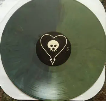 <u>PRESSING INFO</u><br><table class=inf_press><tbody><tr class=inf_info><td class=inf_title>Album:</td><td class=inf_info> Goddamnit Redux on Random Colour 'Half Light Green / Half Dark Green'  </td></tr>
    <td class=inf_title>Pressing:</td><td> Sixteenth Pressing /1000  </td></tr>
    <td class=inf_title>Release Date:</td><td> Feb. 15th 2021  </td></tr>
    <td class=inf_title>Album Pressed:</td><td> 2021  </td></tr>
    <td class=inf_title>Label:</td><td> Asianman Records AM-160  </td></tr>
    <td class=inf_title>Insert:</td><td> Double Sided Glossy  </td></tr>
    <td class=inf_title>Barcode:</td><td> 6 12851-01601 9  </td></tr>
    <td class=inf_title>Side A Matrix:</td><td> [etched] AM-160-A S-65748 [stamped] GOLDEN  </td></tr>
    <td class=inf_title>Side B Matrix:</td><td> [etched] AM-160-B S-65749 [stamped] GOLDEN  </td></tr>
    <td class=inf_title>&nbsp;</td><td> <a href=https://www.discogs.com/release/17544028-Alkaline-Trio-Goddamnit target=_blank rel=noopener noreferrer>View This Release on Discogs</a>  </tr></tbody></table>
<br><u>PRICING</u><span class='less' style='padding-left: 8px; color: var(--font-colour_grey);'>(prices shown in USD)</span><br><table class='inf_press'><tbody><tr class='inf_info'>
            <td class='inf_title'>Last Sold:</td>
            <td>$33.15 (Feb 7, 2025)</td>
            </tr><tr class='inf_info'>
            <td class='inf_title'>History:</td>
            <td>
                <span class='price-low' title='Sold on Aug 29, 2021'>Low: <span class='price-value'>$15.00</span></span>
                <span class='price-separator'>|</span>
                <span class='price-avg'>Avg: <span class='price-value'>$29.77</span></span>
                <span class='price-separator'>|</span>
                <span class='price-high' title='Sold on Jun 17, 2021'>High: <span class='price-value'>$39.99</span></span>
            </td>
            </tr></tbody></table><br>    <br><br><u>TRACKLIST</u><br><table class='inf_tracks'><tbody><tr>
            <td class='inf_num'>A1</td>
            <td class='inf_trk'>Cringe</td>
            <td class='inf_len'>2:23</td>
            <td><a href='#' class='lyric-link' data-album-code='gd' data-song-title='Cringe'>Lyrics</a></td></tr><tr>
            <td class='inf_num'>A2</td>
            <td class='inf_trk'>Cop</td>
            <td class='inf_len'>2:18</td>
            <td><a href='#' class='lyric-link' data-album-code='gd' data-song-title='Cop'>Lyrics</a></td></tr><tr>
            <td class='inf_num'>A3</td>
            <td class='inf_trk'>San Francisco</td>
            <td class='inf_len'>3:52</td>
            <td><a href='#' class='lyric-link' data-album-code='gd' data-song-title='San Francisco'>Lyrics</a></td></tr><tr>
            <td class='inf_num'>A4</td>
            <td class='inf_trk'>Nose Over Tail</td>
            <td class='inf_len'>2:37</td>
            <td><a href='#' class='lyric-link' data-album-code='gd' data-song-title='Nose Over Tail'>Lyrics</a></td></tr><tr>
            <td class='inf_num'>A5</td>
            <td class='inf_trk'>As You Were</td>
            <td class='inf_len'>2:11</td>
            <td><a href='#' class='lyric-link' data-album-code='gd' data-song-title='As You Were'>Lyrics</a></td></tr><tr>
            <td class='inf_num'>A6</td>
            <td class='inf_trk'>Enjoy Your Day</td>
            <td class='inf_len'>2:17</td>
            <td><a href='#' class='lyric-link' data-album-code='gd' data-song-title='Enjoy Your Day'>Lyrics</a></td></tr><tr>
            <td class='inf_num'>A7</td>
            <td class='inf_trk'>Clavicle</td>
            <td class='inf_len'>2:28</td>
            <td><a href='#' class='lyric-link' data-album-code='gd' data-song-title='Clavicle'>Lyrics</a></td></tr><tr>
            <td class='inf_num'>B1</td>
            <td class='inf_trk'>My Little Needle</td>
            <td class='inf_len'>3:01</td>
            <td><a href='#' class='lyric-link' data-album-code='gd' data-song-title='My Little Needle'>Lyrics</a></td></tr><tr>
            <td class='inf_num'>B2</td>
            <td class='inf_trk'>Southern Rock</td>
            <td class='inf_len'>3:05</td>
            <td><a href='#' class='lyric-link' data-album-code='gd' data-song-title='Southern Rock'>Lyrics</a></td></tr><tr>
            <td class='inf_num'>B3</td>
            <td class='inf_trk'>Message From Kathlene</td>
            <td class='inf_len'>3:22</td>
            <td><a href='#' class='lyric-link' data-album-code='gd' data-song-title='Message From Kathlene'>Lyrics</a></td></tr><tr>
            <td class='inf_num'>B4</td>
            <td class='inf_trk'>Trouble Breathing</td>
            <td class='inf_len'>3:55</td>
            <td><a href='#' class='lyric-link' data-album-code='gd' data-song-title='Trouble Breathing'>Lyrics</a></td></tr><tr>
            <td class='inf_num'>B5</td>
            <td class='inf_trk'>Sorry About That</td>
            <td class='inf_len'>3:21</td>
            <td><a href='#' class='lyric-link' data-album-code='gd' data-song-title='Sorry About That'>Lyrics</a></td></tr></tbody></table><br><br>
    <u>NOTES</u><br> Thin white border around insert. Former DVD order form is now covered by Heart/Skull logos. Center labels are black Heart/Skull logos. The sleeve of this release has a flat finish, compared to previous pressings that had glossy features.
 - B