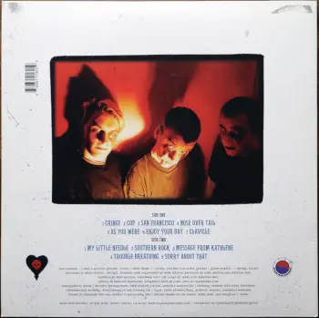 <u>PRESSING INFO</u><br><table class=inf_press><tbody><tr class=inf_info><td class=inf_title>Album:</td><td class=inf_info> Goddamnit Redux on Random Colour 'Half Teal / Half Copper'  </td></tr>
    <td class=inf_title>Pressing:</td><td> Sixteenth Pressing /1000  </td></tr>
    <td class=inf_title>Release Date:</td><td> Feb. 15th 2021  </td></tr>
    <td class=inf_title>Album Pressed:</td><td> 2021  </td></tr>
    <td class=inf_title>Label:</td><td> Asianman Records AM-160  </td></tr>
    <td class=inf_title>Insert:</td><td> Double Sided Glossy  </td></tr>
    <td class=inf_title>Barcode:</td><td> 6 12851-01601 9  </td></tr>
    <td class=inf_title>Side A Matrix:</td><td> [etched] AM-160-A S-65748 [stamped] GOLDEN  </td></tr>
    <td class=inf_title>Side B Matrix:</td><td> [etched] AM-160-B S-65749 [stamped] GOLDEN  </td></tr>
    <td class=inf_title>&nbsp;</td><td> <a href=https://www.discogs.com/release/17544028-Alkaline-Trio-Goddamnit target=_blank rel=noopener noreferrer>View This Release on Discogs</a>  </tr></tbody></table>
    <br><u>TRACKLIST</u><br><table class='inf_tracks'><tbody><tr>
            <td class='inf_num'>A1</td>
            <td class='inf_trk'>Cringe</td>
            <td class='inf_len'>2:23</td>
            <td><a href='#' class='lyric-link' data-album-code='gd' data-song-title='Cringe'>Lyrics</a></td></tr><tr>
            <td class='inf_num'>A2</td>
            <td class='inf_trk'>Cop</td>
            <td class='inf_len'>2:18</td>
            <td><a href='#' class='lyric-link' data-album-code='gd' data-song-title='Cop'>Lyrics</a></td></tr><tr>
            <td class='inf_num'>A3</td>
            <td class='inf_trk'>San Francisco</td>
            <td class='inf_len'>3:52</td>
            <td><a href='#' class='lyric-link' data-album-code='gd' data-song-title='San Francisco'>Lyrics</a></td></tr><tr>
            <td class='inf_num'>A4</td>
            <td class='inf_trk'>Nose Over Tail</td>
            <td class='inf_len'>2:37</td>
            <td><a href='#' class='lyric-link' data-album-code='gd' data-song-title='Nose Over Tail'>Lyrics</a></td></tr><tr>
            <td class='inf_num'>A5</td>
            <td class='inf_trk'>As You Were</td>
            <td class='inf_len'>2:11</td>
            <td><a href='#' class='lyric-link' data-album-code='gd' data-song-title='As You Were'>Lyrics</a></td></tr><tr>
            <td class='inf_num'>A6</td>
            <td class='inf_trk'>Enjoy Your Day</td>
            <td class='inf_len'>2:17</td>
            <td><a href='#' class='lyric-link' data-album-code='gd' data-song-title='Enjoy Your Day'>Lyrics</a></td></tr><tr>
            <td class='inf_num'>A7</td>
            <td class='inf_trk'>Clavicle</td>
            <td class='inf_len'>2:28</td>
            <td><a href='#' class='lyric-link' data-album-code='gd' data-song-title='Clavicle'>Lyrics</a></td></tr><tr>
            <td class='inf_num'>B1</td>
            <td class='inf_trk'>My Little Needle</td>
            <td class='inf_len'>3:01</td>
            <td><a href='#' class='lyric-link' data-album-code='gd' data-song-title='My Little Needle'>Lyrics</a></td></tr><tr>
            <td class='inf_num'>B2</td>
            <td class='inf_trk'>Southern Rock</td>
            <td class='inf_len'>3:05</td>
            <td><a href='#' class='lyric-link' data-album-code='gd' data-song-title='Southern Rock'>Lyrics</a></td></tr><tr>
            <td class='inf_num'>B3</td>
            <td class='inf_trk'>Message From Kathlene</td>
            <td class='inf_len'>3:22</td>
            <td><a href='#' class='lyric-link' data-album-code='gd' data-song-title='Message From Kathlene'>Lyrics</a></td></tr><tr>
            <td class='inf_num'>B4</td>
            <td class='inf_trk'>Trouble Breathing</td>
            <td class='inf_len'>3:55</td>
            <td><a href='#' class='lyric-link' data-album-code='gd' data-song-title='Trouble Breathing'>Lyrics</a></td></tr><tr>
            <td class='inf_num'>B5</td>
            <td class='inf_trk'>Sorry About That</td>
            <td class='inf_len'>3:21</td>
            <td><a href='#' class='lyric-link' data-album-code='gd' data-song-title='Sorry About That'>Lyrics</a></td></tr></tbody></table><br>
    <u>NOTES</u><br> Thin white border around insert. Former DVD order form is now covered by Heart/Skull logos. Center labels are black Heart/Skull logos. The sleeve of this release has a flat finish, compared to previous pressings that had glossy features.
 - Back