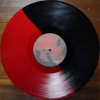<u>PRESSING INFO</u><br><table class=inf_press><tbody><tr class=inf_info><td class=inf_title>Album:</td><td class=inf_info> Goddamnit Redux on Half Black / Half Red  </td></tr>
    <td class=inf_title>Pressing:</td><td> First Pressing /500  </td></tr>
    <td class=inf_title>Release Date:</td><td> Mar. 11th 2008  </td></tr>
    <td class=inf_title>Album Pressed:</td><td> 2008  </td></tr>
    <td class=inf_title>Label:</td><td> Asianman Records AM-160  </td></tr>
    <td class=inf_title>Insert:</td><td> Double Sided Glossy  </td></tr>
    <td class=inf_title>Barcode:</td><td> 6 12851-01601 9  </td></tr>
    <td class=inf_title>Side A Matrix:</td><td> 74940E1/B GOD  </td></tr>
    <td class=inf_title>Side B Matrix:</td><td> 74940E2/A DAMNIT!  </td></tr>
    <td class=inf_title>&nbsp;</td><td> <a href=https://www.discogs.com/release/1584606-Alkaline-Trio-Goddamnit target=_blank rel=noopener noreferrer>View This Release on Discogs</a>  </tr></tbody></table>
<br><u>PRICING</u><span class='less' style='padding-left: 8px; color: var(--font-colour_grey);'>(prices shown in USD)</span><br><table class='inf_press'><tbody><tr class='inf_info'>
            <td class='inf_title'>Last Sold:</td>
            <td>$49.99 (Mar 24, 2025)</td>
            </tr><tr class='inf_info'>
            <td class='inf_title'>History:</td>
            <td>
                <span class='price-low' title='Sold on Jan 30, 2017'>Low: <span class='price-value'>$15.00</span></span>
                <span class='price-separator'>|</span>
                <span class='price-avg'>Avg: <span class='price-value'>$34.98</span></span>
                <span class='price-separator'>|</span>
                <span class='price-high' title='Sold on Aug 30, 2023'>High: <span class='price-value'>$89.00</span></span>
            </td>
            </tr></tbody></table><br>    <br><br><u>TRACKLIST</u><br><table class='inf_tracks'><tbody><tr>
            <td class='inf_num'>A1</td>
            <td class='inf_trk'>Cringe</td>
            <td class='inf_len'>2:23</td>
            <td><a href='#' class='lyric-link' data-album-code='gd' data-song-title='Cringe'>Lyrics</a></td></tr><tr>
            <td class='inf_num'>A2</td>
            <td class='inf_trk'>Cop</td>
            <td class='inf_len'>2:18</td>
            <td><a href='#' class='lyric-link' data-album-code='gd' data-song-title='Cop'>Lyrics</a></td></tr><tr>
            <td class='inf_num'>A3</td>
            <td class='inf_trk'>San Francisco</td>
            <td class='inf_len'>3:52</td>
            <td><a href='#' class='lyric-link' data-album-code='gd' data-song-title='San Francisco'>Lyrics</a></td></tr><tr>
            <td class='inf_num'>A4</td>
            <td class='inf_trk'>Nose Over Tail</td>
            <td class='inf_len'>2:37</td>
            <td><a href='#' class='lyric-link' data-album-code='gd' data-song-title='Nose Over Tail'>Lyrics</a></td></tr><tr>
            <td class='inf_num'>A5</td>
            <td class='inf_trk'>As You Were</td>
            <td class='inf_len'>2:11</td>
            <td><a href='#' class='lyric-link' data-album-code='gd' data-song-title='As You Were'>Lyrics</a></td></tr><tr>
            <td class='inf_num'>A6</td>
            <td class='inf_trk'>Enjoy Your Day</td>
            <td class='inf_len'>2:17</td>
            <td><a href='#' class='lyric-link' data-album-code='gd' data-song-title='Enjoy Your Day'>Lyrics</a></td></tr><tr>
            <td class='inf_num'>A7</td>
            <td class='inf_trk'>Clavicle</td>
            <td class='inf_len'>2:28</td>
            <td><a href='#' class='lyric-link' data-album-code='gd' data-song-title='Clavicle'>Lyrics</a></td></tr><tr>
            <td class='inf_num'>B1</td>
            <td class='inf_trk'>My Little Needle</td>
            <td class='inf_len'>3:01</td>
            <td><a href='#' class='lyric-link' data-album-code='gd' data-song-title='My Little Needle'>Lyrics</a></td></tr><tr>
            <td class='inf_num'>B2</td>
            <td class='inf_trk'>Southern Rock</td>
            <td class='inf_len'>3:05</td>
            <td><a href='#' class='lyric-link' data-album-code='gd' data-song-title='Southern Rock'>Lyrics</a></td></tr><tr>
            <td class='inf_num'>B3</td>
            <td class='inf_trk'>Message From Kathlene</td>
            <td class='inf_len'>3:22</td>
            <td><a href='#' class='lyric-link' data-album-code='gd' data-song-title='Message From Kathlene'>Lyrics</a></td></tr><tr>
            <td class='inf_num'>B4</td>
            <td class='inf_trk'>Trouble Breathing</td>
            <td class='inf_len'>3:55</td>
            <td><a href='#' class='lyric-link' data-album-code='gd' data-song-title='Trouble Breathing'>Lyrics</a></td></tr><tr>
            <td class='inf_num'>B5</td>
            <td class='inf_trk'>Sorry About That</td>
            <td class='inf_len'>3:21</td>
            <td><a href='#' class='lyric-link' data-album-code='gd' data-song-title='Sorry About That'>Lyrics</a></td></tr></tbody></table><br><br>
    <u>NOTES</u><br> This 1st pressing has a matte cover but the lettering and clocks on the front, as well as the track titles and Heart & Skull logo on the back, have a glossy finish.
 - B