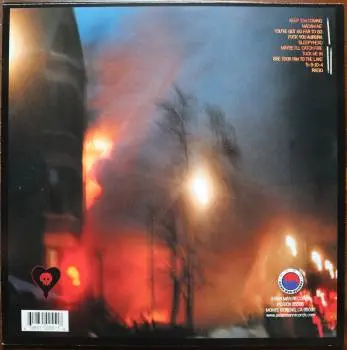 <u>PRESSING INFO</u><br><table class=inf_press><tbody><tr class=inf_info><td class=inf_title>Album:</td><td class=inf_info> Maybe I'll Catch Fire on Clear Orange  </td></tr>
    <td class=inf_title>Pressing:</td><td> Fourteenth Pressing /1000  </td></tr>
    <td class=inf_title>Release Date:</td><td> Oct. 2021  </td></tr>
    <td class=inf_title>Album Pressed:</td><td> 2021  </td></tr>
    <td class=inf_title>Label:</td><td> Asianman Records AM 055  </td></tr>
    <td class=inf_title>Insert:</td><td> Single Sided Glossy  </td></tr>
    <td class=inf_title>Barcode:</td><td> 6 12851-0055-1 8  </td></tr>
    <td class=inf_title>Side A Matrix:</td><td> 1089-AM055- 1 A 5 S-65692  </td></tr>
    <td class=inf_title>Side B Matrix:</td><td> 7689-AM055-1(B) S-68693  </td></tr>
    <td class=inf_title>&nbsp;</td><td> <a href=https://www.discogs.com/release/19923781 target=_blank rel=noopener noreferrer>View This Release on Discogs</a>  </tr></tbody></table>
<br><u>PRICING</u><span class='less' style='padding-left: 8px; color: var(--font-colour_grey);'>(prices shown in USD)</span><br><table class='inf_press'><tbody><tr class='inf_info'>
            <td class='inf_title'>Last Sold:</td>
            <td>$25.00 (Apr 13, 2026)</td>
            </tr><tr class='inf_info'>
            <td class='inf_title'>History:</td>
            <td>
                <span class='price-low' title='Sold on Jan 27, 2025'>Low: <span class='price-value'>$10.00</span></span>
                <span class='price-separator'>|</span>
                <span class='price-avg'>Avg: <span class='price-value'>$25.84</span></span>
                <span class='price-separator'>|</span>
                <span class='price-high' title='Sold on Aug 11, 2022'>High: <span class='price-value'>$55.00</span></span>
            </td>
            </tr></tbody></table><br>    <br><br><u>TRACKLIST</u><br><table class='inf_tracks'><tbody><tr>
            <td class='inf_num'>A1</td>
            <td class='inf_trk'>Keep ’Em Coming</td>
            <td class='inf_len'>4:10</td>
            <td><a href='#' class='lyric-link' data-album-code='micf' data-song-title='Keep ’Em Coming'>Lyrics</a></td></tr><tr>
            <td class='inf_num'>A2</td>
            <td class='inf_trk'>Madam Me</td>
            <td class='inf_len'>2:59</td>
            <td><a href='#' class='lyric-link' data-album-code='micf' data-song-title='Madam Me'>Lyrics</a></td></tr><tr>
            <td class='inf_num'>A3</td>
            <td class='inf_trk'>You’ve Got So Far To Go</td>
            <td class='inf_len'>3:14</td>
            <td><a href='#' class='lyric-link' data-album-code='micf' data-song-title='You’ve Got So Far To Go'>Lyrics</a></td></tr><tr>
            <td class='inf_num'>A4</td>
            <td class='inf_trk'>Fuck You Aurora</td>
            <td class='inf_len'>4:49</td>
            <td><a href='#' class='lyric-link' data-album-code='micf' data-song-title='Fuck You Aurora'>Lyrics</a></td></tr><tr>
            <td class='inf_num'>A5</td>
            <td class='inf_trk'>Sleepyhead</td>
            <td class='inf_len'>3:56</td>
            <td><a href='#' class='lyric-link' data-album-code='micf' data-song-title='Sleepyhead'>Lyrics</a></td></tr><tr>
            <td class='inf_num'>B1</td>
            <td class='inf_trk'>Maybe I’ll Catch Fire</td>
            <td class='inf_len'>3:07</td>
            <td><a href='#' class='lyric-link' data-album-code='micf' data-song-title='Maybe I’ll Catch Fire'>Lyrics</a></td></tr><tr>
            <td class='inf_num'>B2</td>
            <td class='inf_trk'>Tuck Me In</td>
            <td class='inf_len'>2:39</td>
            <td><a href='#' class='lyric-link' data-album-code='micf' data-song-title='Tuck Me In'>Lyrics</a></td></tr><tr>
            <td class='inf_num'>B3</td>
            <td class='inf_trk'>She Took Him To The Lake</td>
            <td class='inf_len'>2:40</td>
            <td><a href='#' class='lyric-link' data-album-code='micf' data-song-title='She Took Him To The Lake'>Lyrics</a></td></tr><tr>
            <td class='inf_num'>B4</td>
            <td class='inf_trk'>5-3-10-4</td>
            <td class='inf_len'>2:56</td>
            <td><a href='#' class='lyric-link' data-album-code='micf' data-song-title='5-3-10-4'>Lyrics</a></td></tr><tr>
            <td class='inf_num'>B5</td>
            <td class='inf_trk'>Radio</td>
            <td class='inf_len'>4:41</td>
            <td><a href='#' class='lyric-link' data-album-code='micf' data-song-title='Radio'>Lyrics</a></td></tr></tbody></table><br><br>
    <u>NOTES</u><br> This pressing is very similar to the 4th pressing on Gold vinyl. The differences are minor, with this 14th pressing being a bit less clear than the 4th pressing. The sleeves are identical, while the inserts for this pressing are Single Sided Glossy, the 4th are Double Sided Glossy. The center labels on this 14th pressing are also lighter compared to the 4th pressing.
 - Back