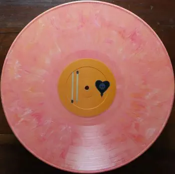 <u>PRESSING INFO</u><br><table class=inf_press><tbody><tr class=inf_info><td class=inf_title>Album:</td><td class=inf_info> Maybe I'll Catch Fire on Orange Marble  </td></tr>
    <td class=inf_title>Pressing:</td><td> First Pressing /1000  </td></tr>
    <td class=inf_title>Release Date:</td><td> 2000  </td></tr>
    <td class=inf_title>Album Pressed:</td><td> 2000  </td></tr>
    <td class=inf_title>Label:</td><td> Asianman Records AM 055  </td></tr>
    <td class=inf_title>Insert:</td><td> Double Sided Glossy  </td></tr>
    <td class=inf_title>Barcode:</td><td> 6 12851-0055-1 8  </td></tr>
    <td class=inf_title>Side A Matrix:</td><td> AM-055-A L-52603 GOLDEN  </td></tr>
    <td class=inf_title>Side B Matrix:</td><td> AM-055-B L-52603x GOLDEN  </td></tr>
    <td class=inf_title>&nbsp;</td><td> <a href=https://www.discogs.com/release/1427996 target=_blank rel=noopener noreferrer>View This Release on Discogs</a>  </tr></tbody></table>
<br><u>PRICING</u><span class='less' style='padding-left: 8px; color: var(--font-colour_grey);'>(prices shown in USD)</span><br><table class='inf_press'><tbody><tr class='inf_info'>
            <td class='inf_title'>Last Sold:</td>
            <td>$60.00 (Nov 11, 2025)</td>
            </tr><tr class='inf_info'>
            <td class='inf_title'>History:</td>
            <td>
                <span class='price-low' title='Sold on Jan 28, 2018'>Low: <span class='price-value'>$50.00</span></span>
                <span class='price-separator'>|</span>
                <span class='price-avg'>Avg: <span class='price-value'>$88.43</span></span>
                <span class='price-separator'>|</span>
                <span class='price-high' title='€140.00 · Sold on Jul 9, 2025'>High: <span class='price-value'>$159.45</span></span>
            </td>
            </tr></tbody></table><br>    <br><br><u>TRACKLIST</u><br><table class='inf_tracks'><tbody><tr>
            <td class='inf_num'>A1</td>
            <td class='inf_trk'>Keep ’Em Coming</td>
            <td class='inf_len'>4:10</td>
            <td><a href='#' class='lyric-link' data-album-code='micf' data-song-title='Keep ’Em Coming'>Lyrics</a></td></tr><tr>
            <td class='inf_num'>A2</td>
            <td class='inf_trk'>Madam Me</td>
            <td class='inf_len'>2:59</td>
            <td><a href='#' class='lyric-link' data-album-code='micf' data-song-title='Madam Me'>Lyrics</a></td></tr><tr>
            <td class='inf_num'>A3</td>
            <td class='inf_trk'>You’ve Got So Far To Go</td>
            <td class='inf_len'>3:14</td>
            <td><a href='#' class='lyric-link' data-album-code='micf' data-song-title='You’ve Got So Far To Go'>Lyrics</a></td></tr><tr>
            <td class='inf_num'>A4</td>
            <td class='inf_trk'>Fuck You Aurora</td>
            <td class='inf_len'>4:49</td>
            <td><a href='#' class='lyric-link' data-album-code='micf' data-song-title='Fuck You Aurora'>Lyrics</a></td></tr><tr>
            <td class='inf_num'>A5</td>
            <td class='inf_trk'>Sleepyhead</td>
            <td class='inf_len'>3:56</td>
            <td><a href='#' class='lyric-link' data-album-code='micf' data-song-title='Sleepyhead'>Lyrics</a></td></tr><tr>
            <td class='inf_num'>B1</td>
            <td class='inf_trk'>Maybe I’ll Catch Fire</td>
            <td class='inf_len'>3:07</td>
            <td><a href='#' class='lyric-link' data-album-code='micf' data-song-title='Maybe I’ll Catch Fire'>Lyrics</a></td></tr><tr>
            <td class='inf_num'>B2</td>
            <td class='inf_trk'>Tuck Me In</td>
            <td class='inf_len'>2:39</td>
            <td><a href='#' class='lyric-link' data-album-code='micf' data-song-title='Tuck Me In'>Lyrics</a></td></tr><tr>
            <td class='inf_num'>B3</td>
            <td class='inf_trk'>She Took Him To The Lake</td>
            <td class='inf_len'>2:40</td>
            <td><a href='#' class='lyric-link' data-album-code='micf' data-song-title='She Took Him To The Lake'>Lyrics</a></td></tr><tr>
            <td class='inf_num'>B4</td>
            <td class='inf_trk'>5-3-10-4</td>
            <td class='inf_len'>2:56</td>
            <td><a href='#' class='lyric-link' data-album-code='micf' data-song-title='5-3-10-4'>Lyrics</a></td></tr><tr>
            <td class='inf_num'>B5</td>
            <td class='inf_trk'>Radio</td>
            <td class='inf_len'>4:41</td>
            <td><a href='#' class='lyric-link' data-album-code='micf' data-song-title='Radio'>Lyrics</a></td></tr></tbody></table><br><br>
    <u>NOTES</u><br> The writing on this insert varies from later double sided glossy inserts.
 - B-pink