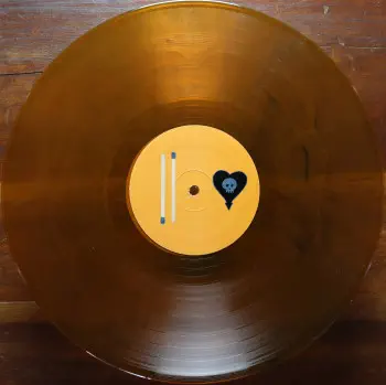 <u>PRESSING INFO</u><br><table class=inf_press><tbody><tr class=inf_info><td class=inf_title>Album:</td><td class=inf_info> Maybe I'll Catch Fire on Clear Orange with Black Swirl (Hot Topic Exclusive)  </td></tr>
    <td class=inf_title>Pressing:</td><td> Second Pressing /1000  </td></tr>
    <td class=inf_title>Release Date:</td><td> 2008  </td></tr>
    <td class=inf_title>Album Pressed:</td><td> 2008  </td></tr>
    <td class=inf_title>Label:</td><td> Asianman Records AM 055  </td></tr>
    <td class=inf_title>Insert:</td><td> Double Sided Matte  </td></tr>
    <td class=inf_title>Barcode:</td><td> 6 12851-0055-1 8  </td></tr>
    <td class=inf_title>Side A Matrix:</td><td> 1089-AM055- 1 A 5 S-65692  </td></tr>
    <td class=inf_title>Side B Matrix:</td><td> 7689-AM055-1(B) S-68693  </td></tr>
    <td class=inf_title>&nbsp;</td><td> <a href=https://www.discogs.com/release/1521898 target=_blank rel=noopener noreferrer>View This Release on Discogs</a>  </tr></tbody></table>
<br><u>PRICING</u><span class='less' style='padding-left: 8px; color: var(--font-colour_grey);'>(prices shown in USD)</span><br><table class='inf_press'><tbody><tr class='inf_info'>
            <td class='inf_title'>Last Sold:</td>
            <td>$12.80 (Apr 29, 2026)</td>
            </tr><tr class='inf_info'>
            <td class='inf_title'>History:</td>
            <td>
                <span class='price-low' title='Sold on Jun 26, 2016'>Low: <span class='price-value'>$8.29</span></span>
                <span class='price-separator'>|</span>
                <span class='price-avg'>Avg: <span class='price-value'>$26.18</span></span>
                <span class='price-separator'>|</span>
                <span class='price-high' title='€75.00 · Sold on Mar 25, 2021'>High: <span class='price-value'>$85.42</span></span>
            </td>
            </tr></tbody></table><br>    <br><br><u>TRACKLIST</u><br><table class='inf_tracks'><tbody><tr>
            <td class='inf_num'>A1</td>
            <td class='inf_trk'>Keep ’Em Coming</td>
            <td class='inf_len'>4:10</td>
            <td><a href='#' class='lyric-link' data-album-code='micf' data-song-title='Keep ’Em Coming'>Lyrics</a></td></tr><tr>
            <td class='inf_num'>A2</td>
            <td class='inf_trk'>Madam Me</td>
            <td class='inf_len'>2:59</td>
            <td><a href='#' class='lyric-link' data-album-code='micf' data-song-title='Madam Me'>Lyrics</a></td></tr><tr>
            <td class='inf_num'>A3</td>
            <td class='inf_trk'>You’ve Got So Far To Go</td>
            <td class='inf_len'>3:14</td>
            <td><a href='#' class='lyric-link' data-album-code='micf' data-song-title='You’ve Got So Far To Go'>Lyrics</a></td></tr><tr>
            <td class='inf_num'>A4</td>
            <td class='inf_trk'>Fuck You Aurora</td>
            <td class='inf_len'>4:49</td>
            <td><a href='#' class='lyric-link' data-album-code='micf' data-song-title='Fuck You Aurora'>Lyrics</a></td></tr><tr>
            <td class='inf_num'>A5</td>
            <td class='inf_trk'>Sleepyhead</td>
            <td class='inf_len'>3:56</td>
            <td><a href='#' class='lyric-link' data-album-code='micf' data-song-title='Sleepyhead'>Lyrics</a></td></tr><tr>
            <td class='inf_num'>B1</td>
            <td class='inf_trk'>Maybe I’ll Catch Fire</td>
            <td class='inf_len'>3:07</td>
            <td><a href='#' class='lyric-link' data-album-code='micf' data-song-title='Maybe I’ll Catch Fire'>Lyrics</a></td></tr><tr>
            <td class='inf_num'>B2</td>
            <td class='inf_trk'>Tuck Me In</td>
            <td class='inf_len'>2:39</td>
            <td><a href='#' class='lyric-link' data-album-code='micf' data-song-title='Tuck Me In'>Lyrics</a></td></tr><tr>
            <td class='inf_num'>B3</td>
            <td class='inf_trk'>She Took Him To The Lake</td>
            <td class='inf_len'>2:40</td>
            <td><a href='#' class='lyric-link' data-album-code='micf' data-song-title='She Took Him To The Lake'>Lyrics</a></td></tr><tr>
            <td class='inf_num'>B4</td>
            <td class='inf_trk'>5-3-10-4</td>
            <td class='inf_len'>2:56</td>
            <td><a href='#' class='lyric-link' data-album-code='micf' data-song-title='5-3-10-4'>Lyrics</a></td></tr><tr>
            <td class='inf_num'>B5</td>
            <td class='inf_trk'>Radio</td>
            <td class='inf_len'>4:41</td>
            <td><a href='#' class='lyric-link' data-album-code='micf' data-song-title='Radio'>Lyrics</a></td></tr></tbody></table><br><br>
    <u>NOTES</u><br> This is a Hot Topic Exclusive.
 - B
