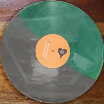 <u>PRESSING INFO</u><br><table class=inf_press><tbody><tr class=inf_info><td class=inf_title>Album:</td><td class=inf_info> Maybe I'll Catch Fire on Random Colour 'Half Clear Green / Half Grey'  </td></tr>
    <td class=inf_title>Pressing:</td><td> Nineteenth Pressing /1000  </td></tr>
    <td class=inf_title>Release Date:</td><td> May 16th 2024  </td></tr>
    <td class=inf_title>Album Pressed:</td><td> 2024  </td></tr>
    <td class=inf_title>Label:</td><td> Asianman Records AM 055  </td></tr>
    <td class=inf_title>Insert:</td><td> Double Sided Glossy  </td></tr>
    <td class=inf_title>Barcode:</td><td> 6 12851-0055-1 8  </td></tr>
    <td class=inf_title>Side A Matrix:</td><td> 1089-AM055- 1 A 5 S-65692  </td></tr>
    <td class=inf_title>Side B Matrix:</td><td> 7689-AM055-1(B) S-68693  </td></tr>
    <td class=inf_title>&nbsp;</td><td> <a href=https://www.discogs.com/release/32106846 target=_blank rel=noopener noreferrer>View This Release on Discogs</a>  </tr></tbody></table>
<br><u>PRICING</u><span class='less' style='padding-left: 8px; color: var(--font-colour_grey);'>(prices shown in USD)</span><br><table class='inf_press'><tbody><tr class='inf_info'>
            <td class='inf_title'>Last Sold:</td>
            <td><span title='Sold for €22.09'>$25.16</span> (Jul 19, 2025)</td>
            </tr><tr class='inf_info'>
            <td class='inf_title'>History:</td>
            <td>
                <span class='price-low' title='Sold on Apr 16, 2025'>Low: <span class='price-value'>$21.98</span></span>
                <span class='price-separator'>|</span>
                <span class='price-avg'>Avg: <span class='price-value'>$23.04</span></span>
                <span class='price-separator'>|</span>
                <span class='price-high' title='€22.09 · Sold on Jul 19, 2025'>High: <span class='price-value'>$25.16</span></span>
            </td>
            </tr></tbody></table><br>    <br><br><u>TRACKLIST</u><br><table class='inf_tracks'><tbody><tr>
            <td class='inf_num'>A1</td>
            <td class='inf_trk'>Keep ’Em Coming</td>
            <td class='inf_len'>4:10</td>
            <td><a href='#' class='lyric-link' data-album-code='micf' data-song-title='Keep ’Em Coming'>Lyrics</a></td></tr><tr>
            <td class='inf_num'>A2</td>
            <td class='inf_trk'>Madam Me</td>
            <td class='inf_len'>2:59</td>
            <td><a href='#' class='lyric-link' data-album-code='micf' data-song-title='Madam Me'>Lyrics</a></td></tr><tr>
            <td class='inf_num'>A3</td>
            <td class='inf_trk'>You’ve Got So Far To Go</td>
            <td class='inf_len'>3:14</td>
            <td><a href='#' class='lyric-link' data-album-code='micf' data-song-title='You’ve Got So Far To Go'>Lyrics</a></td></tr><tr>
            <td class='inf_num'>A4</td>
            <td class='inf_trk'>Fuck You Aurora</td>
            <td class='inf_len'>4:49</td>
            <td><a href='#' class='lyric-link' data-album-code='micf' data-song-title='Fuck You Aurora'>Lyrics</a></td></tr><tr>
            <td class='inf_num'>A5</td>
            <td class='inf_trk'>Sleepyhead</td>
            <td class='inf_len'>3:56</td>
            <td><a href='#' class='lyric-link' data-album-code='micf' data-song-title='Sleepyhead'>Lyrics</a></td></tr><tr>
            <td class='inf_num'>B1</td>
            <td class='inf_trk'>Maybe I’ll Catch Fire</td>
            <td class='inf_len'>3:07</td>
            <td><a href='#' class='lyric-link' data-album-code='micf' data-song-title='Maybe I’ll Catch Fire'>Lyrics</a></td></tr><tr>
            <td class='inf_num'>B2</td>
            <td class='inf_trk'>Tuck Me In</td>
            <td class='inf_len'>2:39</td>
            <td><a href='#' class='lyric-link' data-album-code='micf' data-song-title='Tuck Me In'>Lyrics</a></td></tr><tr>
            <td class='inf_num'>B3</td>
            <td class='inf_trk'>She Took Him To The Lake</td>
            <td class='inf_len'>2:40</td>
            <td><a href='#' class='lyric-link' data-album-code='micf' data-song-title='She Took Him To The Lake'>Lyrics</a></td></tr><tr>
            <td class='inf_num'>B4</td>
            <td class='inf_trk'>5-3-10-4</td>
            <td class='inf_len'>2:56</td>
            <td><a href='#' class='lyric-link' data-album-code='micf' data-song-title='5-3-10-4'>Lyrics</a></td></tr><tr>
            <td class='inf_num'>B5</td>
            <td class='inf_trk'>Radio</td>
            <td class='inf_len'>4:41</td>
            <td><a href='#' class='lyric-link' data-album-code='micf' data-song-title='Radio'>Lyrics</a></td></tr></tbody></table><br><br>
    <u>NOTES</u><br> This photo was taken from eBay, straightened in post.
 - B