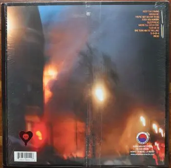 <u>PRESSING INFO</u><br><table class=inf_press><tbody><tr class=inf_info><td class=inf_title>Album:</td><td class=inf_info> Maybe I'll Catch Fire on Clear Red with Black Swirl  </td></tr>
    <td class=inf_title>Pressing:</td><td> Second Pressing /500  </td></tr>
    <td class=inf_title>Release Date:</td><td> 2008  </td></tr>
    <td class=inf_title>Album Pressed:</td><td> 2008  </td></tr>
    <td class=inf_title>Label:</td><td> Asianman Records AM 055  </td></tr>
    <td class=inf_title>Insert:</td><td> Double Sided Matte  </td></tr>
    <td class=inf_title>Barcode:</td><td> 6 12851-0055-1 8  </td></tr>
    <td class=inf_title>Side A Matrix:</td><td> 1089-AM055- 1 A 5 S-65692  </td></tr>
    <td class=inf_title>Side B Matrix:</td><td> 7689-AM055-1(B) S-68693  </td></tr>
    <td class=inf_title>&nbsp;</td><td> <a href=https://www.discogs.com/release/1521897 target=_blank rel=noopener noreferrer>View This Release on Discogs</a>  </tr></tbody></table>
<br><u>PRICING</u><span class='less' style='padding-left: 8px; color: var(--font-colour_grey);'>(prices shown in USD)</span><br><table class='inf_press'><tbody><tr class='inf_info'>
            <td class='inf_title'>Last Sold:</td>
            <td>$17.00 (Feb 26, 2025)</td>
            </tr><tr class='inf_info'>
            <td class='inf_title'>History:</td>
            <td>
                <span class='price-low' title='A$23.00 · Sold on Jun 23, 2013'>Low: <span class='price-value'>$16.10</span></span>
                <span class='price-separator'>|</span>
                <span class='price-avg'>Avg: <span class='price-value'>$28.11</span></span>
                <span class='price-separator'>|</span>
                <span class='price-high' title='Sold on Jan 1, 2021'>High: <span class='price-value'>$66.60</span></span>
            </td>
            </tr></tbody></table><br>    <br><br><u>TRACKLIST</u><br><table class='inf_tracks'><tbody><tr>
            <td class='inf_num'>A1</td>
            <td class='inf_trk'>Keep ’Em Coming</td>
            <td class='inf_len'>4:10</td>
            <td><a href='#' class='lyric-link' data-album-code='micf' data-song-title='Keep ’Em Coming'>Lyrics</a></td></tr><tr>
            <td class='inf_num'>A2</td>
            <td class='inf_trk'>Madam Me</td>
            <td class='inf_len'>2:59</td>
            <td><a href='#' class='lyric-link' data-album-code='micf' data-song-title='Madam Me'>Lyrics</a></td></tr><tr>
            <td class='inf_num'>A3</td>
            <td class='inf_trk'>You’ve Got So Far To Go</td>
            <td class='inf_len'>3:14</td>
            <td><a href='#' class='lyric-link' data-album-code='micf' data-song-title='You’ve Got So Far To Go'>Lyrics</a></td></tr><tr>
            <td class='inf_num'>A4</td>
            <td class='inf_trk'>Fuck You Aurora</td>
            <td class='inf_len'>4:49</td>
            <td><a href='#' class='lyric-link' data-album-code='micf' data-song-title='Fuck You Aurora'>Lyrics</a></td></tr><tr>
            <td class='inf_num'>A5</td>
            <td class='inf_trk'>Sleepyhead</td>
            <td class='inf_len'>3:56</td>
            <td><a href='#' class='lyric-link' data-album-code='micf' data-song-title='Sleepyhead'>Lyrics</a></td></tr><tr>
            <td class='inf_num'>B1</td>
            <td class='inf_trk'>Maybe I’ll Catch Fire</td>
            <td class='inf_len'>3:07</td>
            <td><a href='#' class='lyric-link' data-album-code='micf' data-song-title='Maybe I’ll Catch Fire'>Lyrics</a></td></tr><tr>
            <td class='inf_num'>B2</td>
            <td class='inf_trk'>Tuck Me In</td>
            <td class='inf_len'>2:39</td>
            <td><a href='#' class='lyric-link' data-album-code='micf' data-song-title='Tuck Me In'>Lyrics</a></td></tr><tr>
            <td class='inf_num'>B3</td>
            <td class='inf_trk'>She Took Him To The Lake</td>
            <td class='inf_len'>2:40</td>
            <td><a href='#' class='lyric-link' data-album-code='micf' data-song-title='She Took Him To The Lake'>Lyrics</a></td></tr><tr>
            <td class='inf_num'>B4</td>
            <td class='inf_trk'>5-3-10-4</td>
            <td class='inf_len'>2:56</td>
            <td><a href='#' class='lyric-link' data-album-code='micf' data-song-title='5-3-10-4'>Lyrics</a></td></tr><tr>
            <td class='inf_num'>B5</td>
            <td class='inf_trk'>Radio</td>
            <td class='inf_len'>4:41</td>
            <td><a href='#' class='lyric-link' data-album-code='micf' data-song-title='Radio'>Lyrics</a></td></tr></tbody></table><br><br>
    <u>NOTES</u><br> There was a bundle Summer of 2008 on Asian Man Records that included 'MICF 180g Black', 'MICF Clear Red with Black Swirl', 'GD 180g Black', 'GD White with Red Swirl', a t-shirt, pint glass, beer coozie, and a button (all with an Olde Style logo).
 - Back