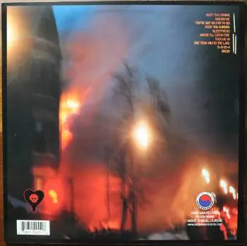 <u>PRESSING INFO</u><br><table class=inf_press><tbody><tr class=inf_info><td class=inf_title>Album:</td><td class=inf_info> Maybe I'll Catch Fire on 180g Clear Red with Black Smoke  </td></tr>
    <td class=inf_title>Pressing:</td><td> Eighth Pressing /800  </td></tr>
    <td class=inf_title>Release Date:</td><td> 2015  </td></tr>
    <td class=inf_title>Album Pressed:</td><td> 2015  </td></tr>
    <td class=inf_title>Label:</td><td> Asianman Records AM 055  </td></tr>
    <td class=inf_title>Insert:</td><td> Single Sided Glossy  </td></tr>
    <td class=inf_title>Barcode:</td><td> 6 12851-0055-1 8  </td></tr>
    <td class=inf_title>Side A Matrix:</td><td> 1089-AM055- 1 A 5 S-65692  </td></tr>
    <td class=inf_title>Side B Matrix:</td><td> 7689-AM055-1(B) S-68693  </td></tr>
    <td class=inf_title>&nbsp;</td><td> <a href=https://www.discogs.com/release/5658224 target=_blank rel=noopener noreferrer>View This Release on Discogs</a>  </tr></tbody></table>
<br><u>PRICING</u><span class='less' style='padding-left: 8px; color: var(--font-colour_grey);'>(prices shown in USD)</span><br><table class='inf_press'><tbody><tr class='inf_info'>
            <td class='inf_title'>Last Sold:</td>
            <td>$22.00 (May 29, 2026)</td>
            </tr><tr class='inf_info'>
            <td class='inf_title'>History:</td>
            <td>
                <span class='price-low' title='Sold on May 30, 2015'>Low: <span class='price-value'>$9.00</span></span>
                <span class='price-separator'>|</span>
                <span class='price-avg'>Avg: <span class='price-value'>$26.17</span></span>
                <span class='price-separator'>|</span>
                <span class='price-high' title='A$90.00 · Sold on May 17, 2022'>High: <span class='price-value'>$62.99</span></span>
            </td>
            </tr></tbody></table><br>    <br><br><u>TRACKLIST</u><br><table class='inf_tracks'><tbody><tr>
            <td class='inf_num'>A1</td>
            <td class='inf_trk'>Keep ’Em Coming</td>
            <td class='inf_len'>4:10</td>
            <td><a href='#' class='lyric-link' data-album-code='micf' data-song-title='Keep ’Em Coming'>Lyrics</a></td></tr><tr>
            <td class='inf_num'>A2</td>
            <td class='inf_trk'>Madam Me</td>
            <td class='inf_len'>2:59</td>
            <td><a href='#' class='lyric-link' data-album-code='micf' data-song-title='Madam Me'>Lyrics</a></td></tr><tr>
            <td class='inf_num'>A3</td>
            <td class='inf_trk'>You’ve Got So Far To Go</td>
            <td class='inf_len'>3:14</td>
            <td><a href='#' class='lyric-link' data-album-code='micf' data-song-title='You’ve Got So Far To Go'>Lyrics</a></td></tr><tr>
            <td class='inf_num'>A4</td>
            <td class='inf_trk'>Fuck You Aurora</td>
            <td class='inf_len'>4:49</td>
            <td><a href='#' class='lyric-link' data-album-code='micf' data-song-title='Fuck You Aurora'>Lyrics</a></td></tr><tr>
            <td class='inf_num'>A5</td>
            <td class='inf_trk'>Sleepyhead</td>
            <td class='inf_len'>3:56</td>
            <td><a href='#' class='lyric-link' data-album-code='micf' data-song-title='Sleepyhead'>Lyrics</a></td></tr><tr>
            <td class='inf_num'>B1</td>
            <td class='inf_trk'>Maybe I’ll Catch Fire</td>
            <td class='inf_len'>3:07</td>
            <td><a href='#' class='lyric-link' data-album-code='micf' data-song-title='Maybe I’ll Catch Fire'>Lyrics</a></td></tr><tr>
            <td class='inf_num'>B2</td>
            <td class='inf_trk'>Tuck Me In</td>
            <td class='inf_len'>2:39</td>
            <td><a href='#' class='lyric-link' data-album-code='micf' data-song-title='Tuck Me In'>Lyrics</a></td></tr><tr>
            <td class='inf_num'>B3</td>
            <td class='inf_trk'>She Took Him To The Lake</td>
            <td class='inf_len'>2:40</td>
            <td><a href='#' class='lyric-link' data-album-code='micf' data-song-title='She Took Him To The Lake'>Lyrics</a></td></tr><tr>
            <td class='inf_num'>B4</td>
            <td class='inf_trk'>5-3-10-4</td>
            <td class='inf_len'>2:56</td>
            <td><a href='#' class='lyric-link' data-album-code='micf' data-song-title='5-3-10-4'>Lyrics</a></td></tr><tr>
            <td class='inf_num'>B5</td>
            <td class='inf_trk'>Radio</td>
            <td class='inf_len'>4:41</td>
            <td><a href='#' class='lyric-link' data-album-code='micf' data-song-title='Radio'>Lyrics</a></td></tr></tbody></table><br><br>
    <u>NOTES</u><br> This may have been the first pressing to switch the inserts to single sided glossy. The lyrics and band picture are on one side, while the reverse is blank white.
 - Back