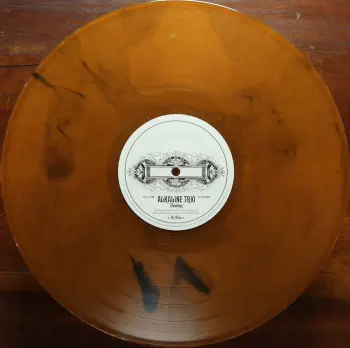 <u>PRESSING INFO</u><br><table class=inf_press><tbody><tr class=inf_info><td class=inf_title>Album:</td><td class=inf_info> Agony & Irony Past Live on Translucent Gold with Black Smoke  </td></tr>
    <td class=inf_title>Pressing:</td><td> First Pressing /500  </td></tr>
    <td class=inf_title>Release Date:</td><td> Dec. 1st 2014  </td></tr>
    <td class=inf_title>Album Pressed:</td><td> 2014  </td></tr>
    <td class=inf_title>Label:</td><td> Epic Records 88697-17247-1  </td></tr>
    <td class=inf_title>Insert:</td><td> Double Sided Glossy  </td></tr>
    <td class=inf_title>Barcode:</td><td> 8 86971-72471 4  </td></tr>
    <td class=inf_title>Side A Matrix:</td><td> 14-0492 A K SST MPO NOISELAND  </td></tr>
    <td class=inf_title>Side B Matrix:</td><td> 14-0492 B K SST MPO NOISELAND  </td></tr>
    <td class=inf_title>&nbsp;</td><td> <a href=https://www.discogs.com/release/6433186 target=_blank rel=noopener noreferrer>View This Release on Discogs</a>  </tr></tbody></table>
<br><u>PRICING</u><span class='less' style='padding-left: 8px; color: var(--font-colour_grey);'>(prices shown in USD)</span><br><table class='inf_press'><tbody><tr class='inf_info'>
            <td class='inf_title'>Last Sold:</td>
            <td>$666.00 (May 19, 2026)</td>
            </tr><tr class='inf_info'>
            <td class='inf_title'>History:</td>
            <td>
                <span class='price-low' title='Sold on Oct 23, 2022'>Low: <span class='price-value'>$79.99</span></span>
                <span class='price-separator'>|</span>
                <span class='price-avg'>Avg: <span class='price-value'>$462.68</span></span>
                <span class='price-separator'>|</span>
                <span class='price-high' title='Sold on Jun 11, 2024'>High: <span class='price-value'>$700.00</span></span>
            </td>
            </tr></tbody></table><br>    <br><br><u>TRACKLIST</u><br><table class='inf_tracks'><tbody><tr>
            <td class='inf_num'>A1</td>
            <td class='inf_trk'>Calling All Skeletons</td>
            <td class='inf_len'>?:??</td>
            <td><a href='#' class='lyric-link' data-album-code='pl' data-song-title='Calling All Skeletons'>Lyrics</a></td></tr><tr>
            <td class='inf_num'>A2</td>
            <td class='inf_trk'>Help Me</td>
            <td class='inf_len'>?:??</td>
            <td><a href='#' class='lyric-link' data-album-code='pl' data-song-title='Help Me'>Lyrics</a></td></tr><tr>
            <td class='inf_num'>A3</td>
            <td class='inf_trk'>In Vein</td>
            <td class='inf_len'>?:??</td>
            <td><a href='#' class='lyric-link' data-album-code='pl' data-song-title='In Vein'>Lyrics</a></td></tr><tr>
            <td class='inf_num'>A4</td>
            <td class='inf_trk'>Over And Out</td>
            <td class='inf_len'>?:??</td>
            <td><a href='#' class='lyric-link' data-album-code='pl' data-song-title='Over And Out'>Lyrics</a></td></tr><tr>
            <td class='inf_num'>A5</td>
            <td class='inf_trk'>I Found Away</td>
            <td class='inf_len'>?:??</td>
            <td><a href='#' class='lyric-link' data-album-code='pl' data-song-title='I Found Away'>Lyrics</a></td></tr><tr>
            <td class='inf_num'>A6</td>
            <td class='inf_trk'>Do You Wanna Know?</td>
            <td class='inf_len'>?:??</td>
            <td><a href='#' class='lyric-link' data-album-code='pl' data-song-title='Do You Wanna Know?'>Lyrics</a></td></tr><tr>
            <td class='inf_num'>B1</td>
            <td class='inf_trk'>Live Young, Die Fast</td>
            <td class='inf_len'>?:??</td>
            <td><a href='#' class='lyric-link' data-album-code='pl' data-song-title='Live Young, Die Fast'>Lyrics</a></td></tr><tr>
            <td class='inf_num'>B2</td>
            <td class='inf_trk'>Love Love, Kiss Kiss</td>
            <td class='inf_len'>?:??</td>
            <td><a href='#' class='lyric-link' data-album-code='pl' data-song-title='Love Love, Kiss Kiss'>Lyrics</a></td></tr><tr>
            <td class='inf_num'>B3</td>
            <td class='inf_trk'>Lost And Rendered</td>
            <td class='inf_len'>?:??</td>
            <td><a href='#' class='lyric-link' data-album-code='pl' data-song-title='Lost And Rendered'>Lyrics</a></td></tr><tr>
            <td class='inf_num'>B4</td>
            <td class='inf_trk'>Ruin It</td>
            <td class='inf_len'>?:??</td>
            <td><a href='#' class='lyric-link' data-album-code='pl' data-song-title='Ruin It'>Lyrics</a></td></tr><tr>
            <td class='inf_num'>B5</td>
            <td class='inf_trk'>Into The Night</td>
            <td class='inf_len'>?:??</td>
            <td><a href='#' class='lyric-link' data-album-code='pl' data-song-title='Into The Night'>Lyrics</a></td></tr></tbody></table><br><br>
    <u>NOTES</u><br> This variant was exclusive to the Past Live Wood Box. Gatefold sleeve. Runout etching specific to this pressing.
 - B