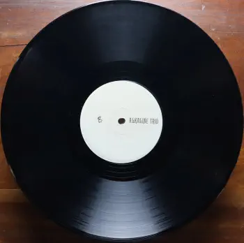 <u>PRESSING INFO</u><br><table class=inf_press><tbody><tr class=inf_info><td class=inf_title>Album:</td><td class=inf_info> Self-Titled on Black  </td></tr>
    <td class=inf_title>Pressing:</td><td> Sixth Pressing /300  </td></tr>
    <td class=inf_title>Release Date:</td><td> 2019  </td></tr>
    <td class=inf_title>Album Pressed:</td><td> 2019  </td></tr>
    <td class=inf_title>Label:</td><td> Asianman Records AM 058  </td></tr>
    <td class=inf_title>Insert:</td><td> Single Sided Glossy  </td></tr>
    <td class=inf_title>Barcode:</td><td> 6 12851-00581 5  </td></tr>
    <td class=inf_title>Side A Matrix:</td><td> 7686-AM058 L (A) S 66267  </td></tr>
    <td class=inf_title>Side B Matrix:</td><td> 7689-AM058-1(B) S-66268  </td></tr>
    <td class=inf_title>&nbsp;</td><td> <a href=https://www.discogs.com/release/10076485 target=_blank rel=noopener noreferrer>View This Release on Discogs</a>  </tr></tbody></table>
<br><u>PRICING</u><span class='less' style='padding-left: 8px; color: var(--font-colour_grey);'>(prices shown in USD)</span><br><table class='inf_press'><tbody><tr class='inf_info'>
            <td class='inf_title'>Last Sold:</td>
            <td>$17.00 (Oct 15, 2022)</td>
            </tr><tr class='inf_info'>
            <td class='inf_title'>History:</td>
            <td>
                <span class='price-low' title='€13.00 · Sold on Oct 25, 2018'>Low: <span class='price-value'>$14.81</span></span>
                <span class='price-separator'>|</span>
                <span class='price-avg'>Avg: <span class='price-value'>$17.27</span></span>
                <span class='price-separator'>|</span>
                <span class='price-high' title='€18.90 · Sold on Nov 18, 2017'>High: <span class='price-value'>$21.53</span></span>
            </td>
            </tr></tbody></table><br>    <br><br><u>TRACKLIST</u><br><table class='inf_tracks'><tbody><tr>
            <td class='inf_num'>A1</td>
            <td class='inf_trk'>Goodbye Forever</td>
            <td class='inf_len'>2:50</td>
            <td><a href='#' class='lyric-link' data-album-code='st' data-song-title='Goodbye Forever'>Lyrics</a></td></tr><tr>
            <td class='inf_num'>A2</td>
            <td class='inf_trk'>This Is Getting Over You</td>
            <td class='inf_len'>4:47</td>
            <td><a href='#' class='lyric-link' data-album-code='st' data-song-title='This Is Getting Over You'>Lyrics</a></td></tr><tr>
            <td class='inf_num'>A3</td>
            <td class='inf_trk'>Bleeder</td>
            <td class='inf_len'>4:30</td>
            <td><a href='#' class='lyric-link' data-album-code='st' data-song-title='Bleeder'>Lyrics</a></td></tr><tr>
            <td class='inf_num'>A4</td>
            <td class='inf_trk'>I Lied My Face Off</td>
            <td class='inf_len'>4:09</td>
            <td><a href='#' class='lyric-link' data-album-code='st' data-song-title='I Lied My Face Off'>Lyrics</a></td></tr><tr>
            <td class='inf_num'>A5</td>
            <td class='inf_trk'>My Friend Peter</td>
            <td class='inf_len'>2:14</td>
            <td><a href='#' class='lyric-link' data-album-code='st' data-song-title='My Friend Peter'>Lyrics</a></td></tr><tr>
            <td class='inf_num'>A6</td>
            <td class='inf_trk'>Snake Oil Tanker</td>
            <td class='inf_len'>1:22</td>
            <td><a href='#' class='lyric-link' data-album-code='st' data-song-title='Snake Oil Tanker'>Lyrics</a></td></tr><tr>
            <td class='inf_num'>B1</td>
            <td class='inf_trk'>Southern Rock</td>
            <td class='inf_len'>3:04</td>
            <td><a href='#' class='lyric-link' data-album-code='st' data-song-title='Southern Rock'>Lyrics</a></td></tr><tr>
            <td class='inf_num'>B2</td>
            <td class='inf_trk'>Cooking Wine</td>
            <td class='inf_len'>2:18</td>
            <td><a href='#' class='lyric-link' data-album-code='st' data-song-title='Cooking Wine'>Lyrics</a></td></tr><tr>
            <td class='inf_num'>B3</td>
            <td class='inf_trk'>For Your Lungs Only</td>
            <td class='inf_len'>2:26</td>
            <td><a href='#' class='lyric-link' data-album-code='st' data-song-title='For Your Lungs Only'>Lyrics</a></td></tr><tr>
            <td class='inf_num'>B4</td>
            <td class='inf_trk'>Sun Dials</td>
            <td class='inf_len'>3:43</td>
            <td><a href='#' class='lyric-link' data-album-code='st' data-song-title='Sun Dials'>Lyrics</a></td></tr><tr>
            <td class='inf_num'>B5</td>
            <td class='inf_trk'>Nose Over Tail</td>
            <td class='inf_len'>2:35</td>
            <td><a href='#' class='lyric-link' data-album-code='st' data-song-title='Nose Over Tail'>Lyrics</a></td></tr><tr>
            <td class='inf_num'>B6</td>
            <td class='inf_trk'>’97</td>
            <td class='inf_len'>4:32</td>
            <td><a href='#' class='lyric-link' data-album-code='st' data-song-title='’97'>Lyrics</a></td></tr></tbody></table><br><br>
    <u>NOTES</u><br> This pressing is the first to change the insert to single sided glossy. The insert is the only way to tell the difference between the 2nd press (matte) and the 6th press (glossy).
 - B