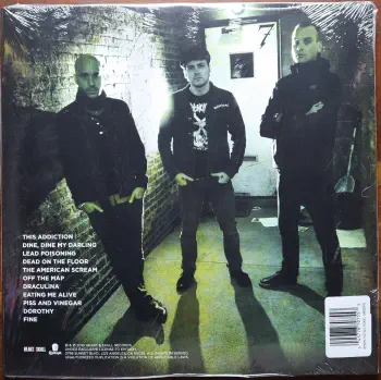 <u>PRESSING INFO</u><br><table class=inf_press><tbody><tr class=inf_info><td class=inf_title>Album:</td><td class=inf_info> This Addiction on Toxic Green (KingsRoadMerch Exclusive)  </td></tr>
    <td class=inf_title>Pressing:</td><td> Second Pressing /1000  </td></tr>
    <td class=inf_title>Release Date:</td><td> Feb. 10th 2023  </td></tr>
    <td class=inf_title>Album Pressed:</td><td> 2023  </td></tr>
    <td class=inf_title>Label:</td><td> Heart&Skull Records/Epitaph 87075-1  </td></tr>
    <td class=inf_title>Insert:</td><td> Printed Satin Inner Sleeve  </td></tr>
    <td class=inf_title>Barcode:</td><td> 0 45778-70751 5  </td></tr>
    <td class=inf_title>Side A Matrix:</td><td> ALKALINE TRIO - THIS ADDICTION EPITAPH 87075-1 2017 A  </td></tr>
    <td class=inf_title>Side B Matrix:</td><td> ALKALINE TRIO - THIS ADDICTION EPITAPH 87075-1 2017 B  </td></tr>
    <td class=inf_title>&nbsp;</td><td> <a href=https://www.discogs.com/release/26278778 target=_blank rel=noopener noreferrer>View This Release on Discogs</a>  </tr></tbody></table>
<br><u>PRICING</u><span class='less' style='padding-left: 8px; color: var(--font-colour_grey);'>(prices shown in USD)</span><br><table class='inf_press'><tbody><tr class='inf_info'>
            <td class='inf_title'>Last Sold:</td>
            <td>$35.00 (Mar 27, 2026)</td>
            </tr><tr class='inf_info'>
            <td class='inf_title'>History:</td>
            <td>
                <span class='price-low' title='Sold on Feb 28, 2026'>Low: <span class='price-value'>$31.99</span></span>
                <span class='price-separator'>|</span>
                <span class='price-avg'>Avg: <span class='price-value'>$41.39</span></span>
                <span class='price-separator'>|</span>
                <span class='price-high' title='Sold on Feb 3, 2026'>High: <span class='price-value'>$49.99</span></span>
            </td>
            </tr></tbody></table><br>    <br><br><u>TRACKLIST</u><br><table class='inf_tracks'><tbody><tr>
            <td class='inf_num'>A1</td>
            <td class='inf_trk'>This Addiction</td>
            <td class='inf_len'>2:35</td>
            <td><a href='#' class='lyric-link' data-album-code='ta' data-song-title='This Addiction'>Lyrics</a></td></tr><tr>
            <td class='inf_num'>A2</td>
            <td class='inf_trk'>Dine, Dine My Darling</td>
            <td class='inf_len'>2:58</td>
            <td><a href='#' class='lyric-link' data-album-code='ta' data-song-title='Dine, Dine My Darling'>Lyrics</a></td></tr><tr>
            <td class='inf_num'>A3</td>
            <td class='inf_trk'>Lead Poisoning</td>
            <td class='inf_len'>2:37</td>
            <td><a href='#' class='lyric-link' data-album-code='ta' data-song-title='Lead Poisoning'>Lyrics</a></td></tr><tr>
            <td class='inf_num'>A4</td>
            <td class='inf_trk'>Dead On The Floor</td>
            <td class='inf_len'>4:20</td>
            <td><a href='#' class='lyric-link' data-album-code='ta' data-song-title='Dead On The Floor'>Lyrics</a></td></tr><tr>
            <td class='inf_num'>A5</td>
            <td class='inf_trk'>The American Scream</td>
            <td class='inf_len'>3:00</td>
            <td><a href='#' class='lyric-link' data-album-code='ta' data-song-title='The American Scream'>Lyrics</a></td></tr><tr>
            <td class='inf_num'>A6</td>
            <td class='inf_trk'>Off The Map</td>
            <td class='inf_len'>3:16</td>
            <td><a href='#' class='lyric-link' data-album-code='ta' data-song-title='Off The Map'>Lyrics</a></td></tr><tr>
            <td class='inf_num'>B1</td>
            <td class='inf_trk'>Draculina</td>
            <td class='inf_len'>3:34</td>
            <td><a href='#' class='lyric-link' data-album-code='ta' data-song-title='Draculina'>Lyrics</a></td></tr><tr>
            <td class='inf_num'>B2</td>
            <td class='inf_trk'>Eating Me Alive</td>
            <td class='inf_len'>2:53</td>
            <td><a href='#' class='lyric-link' data-album-code='ta' data-song-title='Eating Me Alive'>Lyrics</a></td></tr><tr>
            <td class='inf_num'>B3</td>
            <td class='inf_trk'>Piss And Vinegar</td>
            <td class='inf_len'>2:28</td>
            <td><a href='#' class='lyric-link' data-album-code='ta' data-song-title='Piss And Vinegar'>Lyrics</a></td></tr><tr>
            <td class='inf_num'>B4</td>
            <td class='inf_trk'>Dorothy</td>
            <td class='inf_len'>3:32</td>
            <td><a href='#' class='lyric-link' data-album-code='ta' data-song-title='Dorothy'>Lyrics</a></td></tr><tr>
            <td class='inf_num'>B5</td>
            <td class='inf_trk'>Fine</td>
            <td class='inf_len'>3:17</td>
            <td><a href='#' class='lyric-link' data-album-code='ta' data-song-title='Fine'>Lyrics</a></td></tr></tbody></table><br><br>
    <u>NOTES</u><br> Gatefold sleeve. Labels without Made in Canada
 - Back