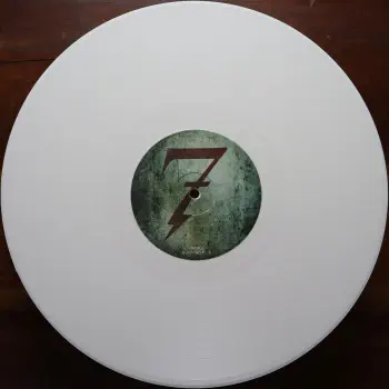 <u>PRESSING INFO</u><br><table class=inf_press><tbody><tr class=inf_info><td class=inf_title>Album:</td><td class=inf_info> This Addiction on White (UK Exclusive)  </td></tr>
    <td class=inf_title>Pressing:</td><td> First Pressing /500  </td></tr>
    <td class=inf_title>Release Date:</td><td> Feb. 23rd 2010  </td></tr>
    <td class=inf_title>Album Pressed:</td><td> 2010  </td></tr>
    <td class=inf_title>Label:</td><td> Heart&Skull Records/Hassle Records HOFF 092LP  </td></tr>
    <td class=inf_title>Insert:</td><td> Printed Glossy Inner Sleeve  </td></tr>
    <td class=inf_title>Barcode:</td><td> 5 060100-667867  </td></tr>
    <td class=inf_title>Side A Matrix:</td><td> HOFF 092 LP.A1  </td></tr>
    <td class=inf_title>Side B Matrix:</td><td> HOFF 092 LP.B1  </td></tr>
    <td class=inf_title>&nbsp;</td><td> <a href=https://www.discogs.com/release/2711915 target=_blank rel=noopener noreferrer>View This Release on Discogs</a>  </tr></tbody></table>
<br><u>PRICING</u><span class='less' style='padding-left: 8px; color: var(--font-colour_grey);'>(prices shown in USD)</span><br><table class='inf_press'><tbody><tr class='inf_info'>
            <td class='inf_title'>Last Sold:</td>
            <td><span title='Sold for €80.00'>$91.11</span> (Oct 16, 2025)</td>
            </tr><tr class='inf_info'>
            <td class='inf_title'>History:</td>
            <td>
                <span class='price-low' title='£8.00 · Sold on Jul 10, 2020'>Low: <span class='price-value'>$10.65</span></span>
                <span class='price-separator'>|</span>
                <span class='price-avg'>Avg: <span class='price-value'>$42.64</span></span>
                <span class='price-separator'>|</span>
                <span class='price-high' title='€80.00 · Sold on Oct 16, 2025'>High: <span class='price-value'>$91.11</span></span>
            </td>
            </tr></tbody></table><br>    <br><br><u>TRACKLIST</u><br><table class='inf_tracks'><tbody><tr>
            <td class='inf_num'>A1</td>
            <td class='inf_trk'>This Addiction</td>
            <td class='inf_len'>2:35</td>
            <td><a href='#' class='lyric-link' data-album-code='ta' data-song-title='This Addiction'>Lyrics</a></td></tr><tr>
            <td class='inf_num'>A2</td>
            <td class='inf_trk'>Dine, Dine My Darling</td>
            <td class='inf_len'>2:58</td>
            <td><a href='#' class='lyric-link' data-album-code='ta' data-song-title='Dine, Dine My Darling'>Lyrics</a></td></tr><tr>
            <td class='inf_num'>A3</td>
            <td class='inf_trk'>Lead Poisoning</td>
            <td class='inf_len'>2:37</td>
            <td><a href='#' class='lyric-link' data-album-code='ta' data-song-title='Lead Poisoning'>Lyrics</a></td></tr><tr>
            <td class='inf_num'>A4</td>
            <td class='inf_trk'>Dead On The Floor</td>
            <td class='inf_len'>4:20</td>
            <td><a href='#' class='lyric-link' data-album-code='ta' data-song-title='Dead On The Floor'>Lyrics</a></td></tr><tr>
            <td class='inf_num'>A5</td>
            <td class='inf_trk'>The American Scream</td>
            <td class='inf_len'>3:00</td>
            <td><a href='#' class='lyric-link' data-album-code='ta' data-song-title='The American Scream'>Lyrics</a></td></tr><tr>
            <td class='inf_num'>A6</td>
            <td class='inf_trk'>Off The Map</td>
            <td class='inf_len'>3:16</td>
            <td><a href='#' class='lyric-link' data-album-code='ta' data-song-title='Off The Map'>Lyrics</a></td></tr><tr>
            <td class='inf_num'>B1</td>
            <td class='inf_trk'>Draculina</td>
            <td class='inf_len'>3:34</td>
            <td><a href='#' class='lyric-link' data-album-code='ta' data-song-title='Draculina'>Lyrics</a></td></tr><tr>
            <td class='inf_num'>B2</td>
            <td class='inf_trk'>Eating Me Alive</td>
            <td class='inf_len'>2:53</td>
            <td><a href='#' class='lyric-link' data-album-code='ta' data-song-title='Eating Me Alive'>Lyrics</a></td></tr><tr>
            <td class='inf_num'>B3</td>
            <td class='inf_trk'>Piss And Vinegar</td>
            <td class='inf_len'>2:28</td>
            <td><a href='#' class='lyric-link' data-album-code='ta' data-song-title='Piss And Vinegar'>Lyrics</a></td></tr><tr>
            <td class='inf_num'>B4</td>
            <td class='inf_trk'>Dorothy</td>
            <td class='inf_len'>3:32</td>
            <td><a href='#' class='lyric-link' data-album-code='ta' data-song-title='Dorothy'>Lyrics</a></td></tr><tr>
            <td class='inf_num'>B5</td>
            <td class='inf_trk'>Fine</td>
            <td class='inf_len'>3:17</td>
            <td><a href='#' class='lyric-link' data-album-code='ta' data-song-title='Fine'>Lyrics</a></td></tr></tbody></table><br><br>
    <u>NOTES</u><br> Gatefold sleeve (higher gloss than US release). Printed inner sleeve (higher gloss and printed on heavier cardstock than US release). Hassle Records markings on sleeve and center labels. Alkaline Trio text on spine is smaller and cat# / heartskull logo placement on spine is different than the US release. Lighter colored labels without Made in Canada
 - B