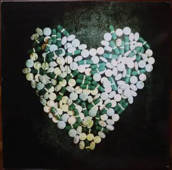 <u>PRESSING INFO</u><br><table class=inf_press><tbody><tr class=inf_info><td class=inf_title>Album:</td><td class=inf_info> This Addiction on White (UK Exclusive)  </td></tr>
    <td class=inf_title>Pressing:</td><td> First Pressing /500  </td></tr>
    <td class=inf_title>Release Date:</td><td> Feb. 23rd 2010  </td></tr>
    <td class=inf_title>Album Pressed:</td><td> 2010  </td></tr>
    <td class=inf_title>Label:</td><td> Heart&Skull Records/Hassle Records HOFF 092LP  </td></tr>
    <td class=inf_title>Insert:</td><td> Printed Glossy Inner Sleeve  </td></tr>
    <td class=inf_title>Barcode:</td><td> 5 060100-667867  </td></tr>
    <td class=inf_title>Side A Matrix:</td><td> HOFF 092 LP.A1  </td></tr>
    <td class=inf_title>Side B Matrix:</td><td> HOFF 092 LP.B1  </td></tr>
    <td class=inf_title>&nbsp;</td><td> <a href=https://www.discogs.com/release/2711915 target=_blank rel=noopener noreferrer>View This Release on Discogs</a>  </tr></tbody></table>
<br><u>PRICING</u><span class='less' style='padding-left: 8px; color: var(--font-colour_grey);'>(prices shown in USD)</span><br><table class='inf_press'><tbody><tr class='inf_info'>
            <td class='inf_title'>Last Sold:</td>
            <td><span title='Sold for €80.00'>$91.11</span> (Oct 16, 2025)</td>
            </tr><tr class='inf_info'>
            <td class='inf_title'>History:</td>
            <td>
                <span class='price-low' title='£8.00 · Sold on Jul 10, 2020'>Low: <span class='price-value'>$10.65</span></span>
                <span class='price-separator'>|</span>
                <span class='price-avg'>Avg: <span class='price-value'>$42.64</span></span>
                <span class='price-separator'>|</span>
                <span class='price-high' title='€80.00 · Sold on Oct 16, 2025'>High: <span class='price-value'>$91.11</span></span>
            </td>
            </tr></tbody></table><br>    <br><br><u>TRACKLIST</u><br><table class='inf_tracks'><tbody><tr>
            <td class='inf_num'>A1</td>
            <td class='inf_trk'>This Addiction</td>
            <td class='inf_len'>2:35</td>
            <td><a href='#' class='lyric-link' data-album-code='ta' data-song-title='This Addiction'>Lyrics</a></td></tr><tr>
            <td class='inf_num'>A2</td>
            <td class='inf_trk'>Dine, Dine My Darling</td>
            <td class='inf_len'>2:58</td>
            <td><a href='#' class='lyric-link' data-album-code='ta' data-song-title='Dine, Dine My Darling'>Lyrics</a></td></tr><tr>
            <td class='inf_num'>A3</td>
            <td class='inf_trk'>Lead Poisoning</td>
            <td class='inf_len'>2:37</td>
            <td><a href='#' class='lyric-link' data-album-code='ta' data-song-title='Lead Poisoning'>Lyrics</a></td></tr><tr>
            <td class='inf_num'>A4</td>
            <td class='inf_trk'>Dead On The Floor</td>
            <td class='inf_len'>4:20</td>
            <td><a href='#' class='lyric-link' data-album-code='ta' data-song-title='Dead On The Floor'>Lyrics</a></td></tr><tr>
            <td class='inf_num'>A5</td>
            <td class='inf_trk'>The American Scream</td>
            <td class='inf_len'>3:00</td>
            <td><a href='#' class='lyric-link' data-album-code='ta' data-song-title='The American Scream'>Lyrics</a></td></tr><tr>
            <td class='inf_num'>A6</td>
            <td class='inf_trk'>Off The Map</td>
            <td class='inf_len'>3:16</td>
            <td><a href='#' class='lyric-link' data-album-code='ta' data-song-title='Off The Map'>Lyrics</a></td></tr><tr>
            <td class='inf_num'>B1</td>
            <td class='inf_trk'>Draculina</td>
            <td class='inf_len'>3:34</td>
            <td><a href='#' class='lyric-link' data-album-code='ta' data-song-title='Draculina'>Lyrics</a></td></tr><tr>
            <td class='inf_num'>B2</td>
            <td class='inf_trk'>Eating Me Alive</td>
            <td class='inf_len'>2:53</td>
            <td><a href='#' class='lyric-link' data-album-code='ta' data-song-title='Eating Me Alive'>Lyrics</a></td></tr><tr>
            <td class='inf_num'>B3</td>
            <td class='inf_trk'>Piss And Vinegar</td>
            <td class='inf_len'>2:28</td>
            <td><a href='#' class='lyric-link' data-album-code='ta' data-song-title='Piss And Vinegar'>Lyrics</a></td></tr><tr>
            <td class='inf_num'>B4</td>
            <td class='inf_trk'>Dorothy</td>
            <td class='inf_len'>3:32</td>
            <td><a href='#' class='lyric-link' data-album-code='ta' data-song-title='Dorothy'>Lyrics</a></td></tr><tr>
            <td class='inf_num'>B5</td>
            <td class='inf_trk'>Fine</td>
            <td class='inf_len'>3:17</td>
            <td><a href='#' class='lyric-link' data-album-code='ta' data-song-title='Fine'>Lyrics</a></td></tr></tbody></table><br><br>
    <u>NOTES</u><br> Gatefold sleeve (higher gloss than US release). Printed inner sleeve (higher gloss and printed on heavier cardstock than US release). Hassle Records markings on sleeve and center labels. Alkaline Trio text on spine is smaller and cat# / heartskull logo placement on spine is different than the US release. Lighter colored labels without Made in Canada
 - Cover