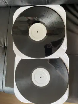<u>PRESSING INFO</u><br><table class=inf_press><tbody><tr class=inf_info><td class=inf_title>Album:</td><td class=inf_info> Remains (Test Press) on Black | Black (White Labels)  </td></tr>
    <td class=inf_title>Pressing:</td><td> First Pressing /??  </td></tr>
    <td class=inf_title>Release Date:</td><td> Jan. 31st 2007  </td></tr>
    <td class=inf_title>Album Pressed:</td><td> 2007  </td></tr>
    <td class=inf_title>Label:</td><td> Vagrant Records/Cobraside CSDLP1111  </td></tr>
    <td class=inf_title>Insert:</td><td> none  </td></tr>
    <td class=inf_title>Barcode:</td><td> none  </td></tr>
    <td class=inf_title>Side A Matrix:</td><td> CSDLP-1111-A  </td></tr>
    <td class=inf_title>Side B Matrix:</td><td> CSDLP-1111-B  </td></tr>
    <td class=inf_title>Side C Matrix:</td><td> CSDLP-1111-C  </td></tr>
    <td class=inf_title>Side D Matrix:</td><td> CSDLP-1111-D  </td></tr>
    <td class=inf_title>&nbsp;</td><td> <a href=https://www.discogs.com/release/1219143 target=_blank rel=noopener noreferrer>View This Release on Discogs</a>  </tr></tbody></table>
    
    <u>NOTES</u><br> Gatefold sleeve
 - Both