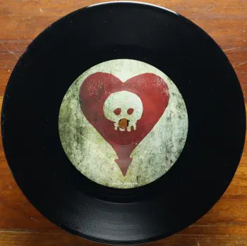 <u>PRESSING INFO</u><br><table class=inf_press><tbody><tr class=inf_info><td class=inf_title>Album:</td><td class=inf_info> This Addiction Single on US Black  </td></tr>
    <td class=inf_title>Pressing:</td><td> First Pressing /??  </td></tr>
    <td class=inf_title>Release Date:</td><td> 2010  </td></tr>
    <td class=inf_title>Album Pressed:</td><td> 2010  </td></tr>
    <td class=inf_title>Label:</td><td> Heart&Skull/Epitaph 87080-7  </td></tr>
    <td class=inf_title>Insert:</td><td> none  </td></tr>
    <td class=inf_title>Barcode:</td><td> 0 45778-70807 9  </td></tr>
    <td class=inf_title>Side A Matrix:</td><td> R-22320 87080-7A RJ STERLING  </td></tr>
    <td class=inf_title>Side B Matrix:</td><td> R-22321 87080-7B RJ STERLING  </td></tr>
    <td class=inf_title>&nbsp;</td><td> <a href=https://www.discogs.com/release/2144340 target=_blank rel=noopener noreferrer>View This Release on Discogs</a>  </tr></tbody></table>
<br><u>PRICING</u><span class='less' style='padding-left: 8px; color: var(--font-colour_grey);'>(prices shown in USD)</span><br><table class='inf_press'><tbody><tr class='inf_info'>
            <td class='inf_title'>Last Sold:</td>
            <td>$12.99 (Jun 26, 2026)</td>
            </tr><tr class='inf_info'>
            <td class='inf_title'>History:</td>
            <td>
                <span class='price-low' title='Sold on Feb 8, 2024'>Low: <span class='price-value'>$2.00</span></span>
                <span class='price-separator'>|</span>
                <span class='price-avg'>Avg: <span class='price-value'>$7.94</span></span>
                <span class='price-separator'>|</span>
                <span class='price-high' title='Sold on Jan 31, 2024'>High: <span class='price-value'>$20.00</span></span>
            </td>
            </tr></tbody></table><br>    <br><br><u>TRACKLIST</u><br><table class='inf_tracks'><tbody><tr>
            <td class='inf_num'>A1</td>
            <td class='inf_trk'>This Addiction</td>
            <td class='inf_len'>2:35</td>
            <td><a href='#' class='lyric-link' data-album-code='singles' data-song-title='This Addiction'>Lyrics</a></td></tr><tr>
            <td class='inf_num'>B1</td>
            <td class='inf_trk'>Dine, Dine My Darling</td>
            <td class='inf_len'>2:58</td>
            <td><a href='#' class='lyric-link' data-album-code='singles' data-song-title='Dine, Dine My Darling'>Lyrics</a></td></tr></tbody></table><br><br>
    <u>NOTES</u><br> B side track is Dine Dine My Darling.
 - B
