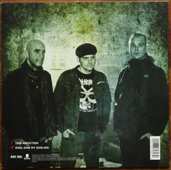 <u>PRESSING INFO</u><br><table class=inf_press><tbody><tr class=inf_info><td class=inf_title>Album:</td><td class=inf_info> This Addiction Single on US Black  </td></tr>
    <td class=inf_title>Pressing:</td><td> First Pressing /??  </td></tr>
    <td class=inf_title>Release Date:</td><td> 2010  </td></tr>
    <td class=inf_title>Album Pressed:</td><td> 2010  </td></tr>
    <td class=inf_title>Label:</td><td> Heart&Skull/Epitaph 87080-7  </td></tr>
    <td class=inf_title>Insert:</td><td> none  </td></tr>
    <td class=inf_title>Barcode:</td><td> 0 45778-70807 9  </td></tr>
    <td class=inf_title>Side A Matrix:</td><td> R-22320 87080-7A RJ STERLING  </td></tr>
    <td class=inf_title>Side B Matrix:</td><td> R-22321 87080-7B RJ STERLING  </td></tr>
    <td class=inf_title>&nbsp;</td><td> <a href=https://www.discogs.com/release/2144340 target=_blank rel=noopener noreferrer>View This Release on Discogs</a>  </tr></tbody></table>
<br><u>PRICING</u><span class='less' style='padding-left: 8px; color: var(--font-colour_grey);'>(prices shown in USD)</span><br><table class='inf_press'><tbody><tr class='inf_info'>
            <td class='inf_title'>Last Sold:</td>
            <td>$12.99 (Jun 26, 2026)</td>
            </tr><tr class='inf_info'>
            <td class='inf_title'>History:</td>
            <td>
                <span class='price-low' title='Sold on Feb 8, 2024'>Low: <span class='price-value'>$2.00</span></span>
                <span class='price-separator'>|</span>
                <span class='price-avg'>Avg: <span class='price-value'>$7.94</span></span>
                <span class='price-separator'>|</span>
                <span class='price-high' title='Sold on Jan 31, 2024'>High: <span class='price-value'>$20.00</span></span>
            </td>
            </tr></tbody></table><br>    <br><br><u>TRACKLIST</u><br><table class='inf_tracks'><tbody><tr>
            <td class='inf_num'>A1</td>
            <td class='inf_trk'>This Addiction</td>
            <td class='inf_len'>2:35</td>
            <td><a href='#' class='lyric-link' data-album-code='singles' data-song-title='This Addiction'>Lyrics</a></td></tr><tr>
            <td class='inf_num'>B1</td>
            <td class='inf_trk'>Dine, Dine My Darling</td>
            <td class='inf_len'>2:58</td>
            <td><a href='#' class='lyric-link' data-album-code='singles' data-song-title='Dine, Dine My Darling'>Lyrics</a></td></tr></tbody></table><br><br>
    <u>NOTES</u><br> B side track is Dine Dine My Darling.
 - Back